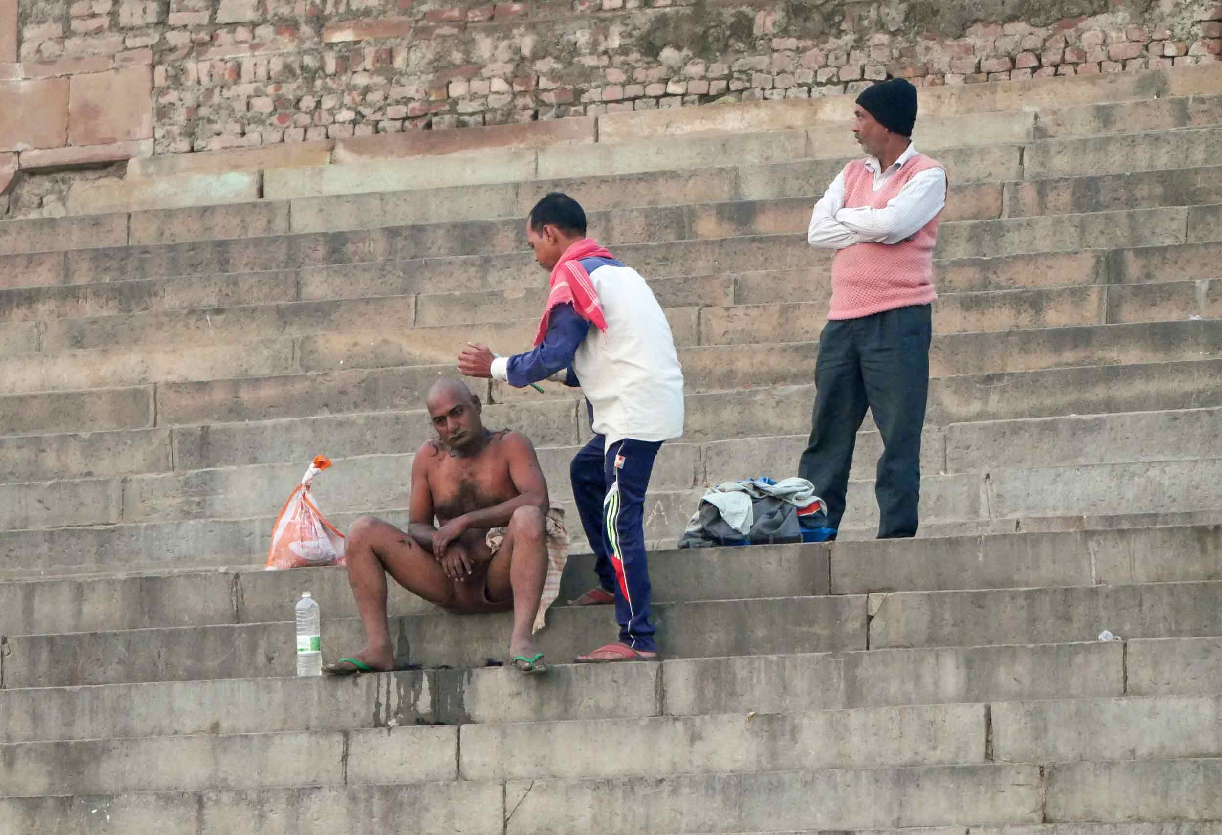  As part of Hindu cremation ritual, male family members of the deceased shave all of their hair. 