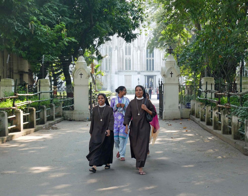  Nuns exiting the grounds of St. Paul’s in Kolkata. 