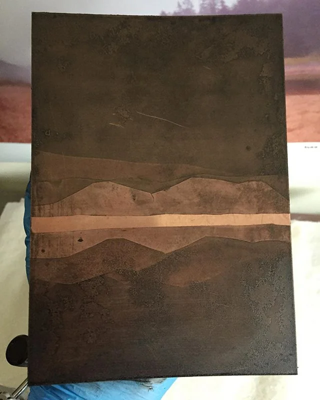 Here are a sampling of shots from my personal research into a DIY mordant that can be created, used, and disposed of safely and affordably at home.
I would love to hear feed back if anyone else has tried this or a similar mix!
My current formula has been 2 parts 3% hydrogen peroxide to 3 parts 5% white vinegar and enough iodine free table salt that it no long dissolves. I have also tried heating the vinegar up before mixing in an attempt to speed up the reaction.
My biggest concern so far is that all of the grounds I have used are breaking down (besides contact paper stencils). I have tried baked on BIG ground, spray on acrylic aquatint, sharpie, and acrylic paint marker. If anyone has other suggestions for grounds that can be safely and easily used in the home studio, let me know!
Also, if anyone out there is keen to the chemistry that is happening here I am interested in knowing more about that and if I can do anything more efficiently.
Thanks for listening all! 🙂
.
.
.
.
.
#etching #printmaking #greenprintmaking #homestudio #print #intaglio #diyordie #copperplateetching #intaglio #intaglioprint #intaglioprintmaking #aquatint #gravure #perspective #perspectivedrawing #lineetching #contemporaryart #contemporaryprintmaking #contemporaryprintmaker #mordant