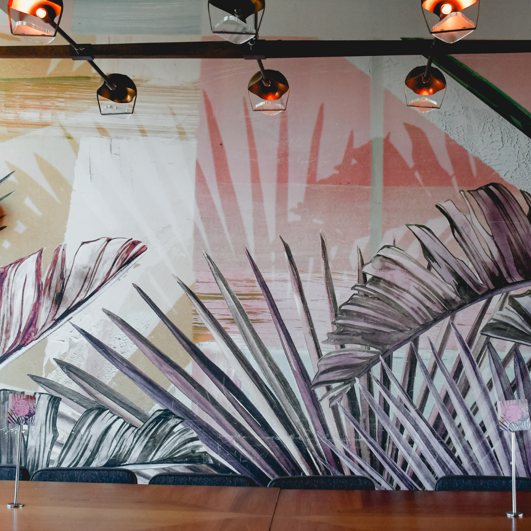 Private table setup inside L.A. Jackson rooftop bar overlooking downtown Nashville.