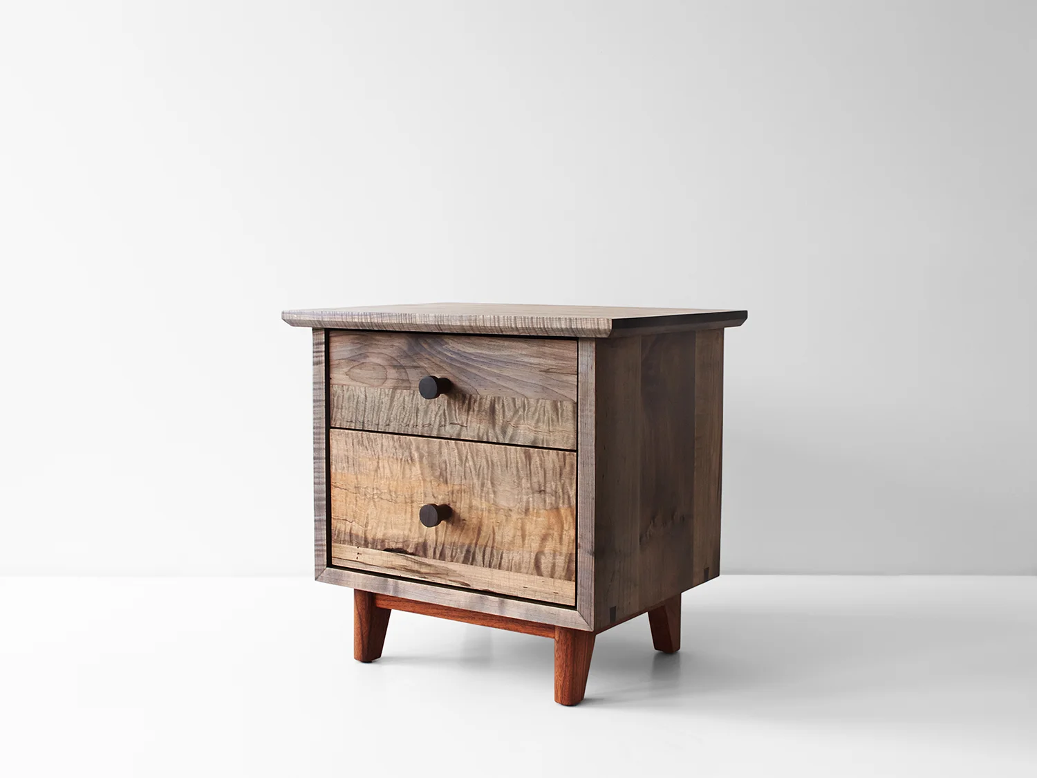 24"L x 18"D x 23"H Oxidized maple case, front & pulls; Black Walnut base