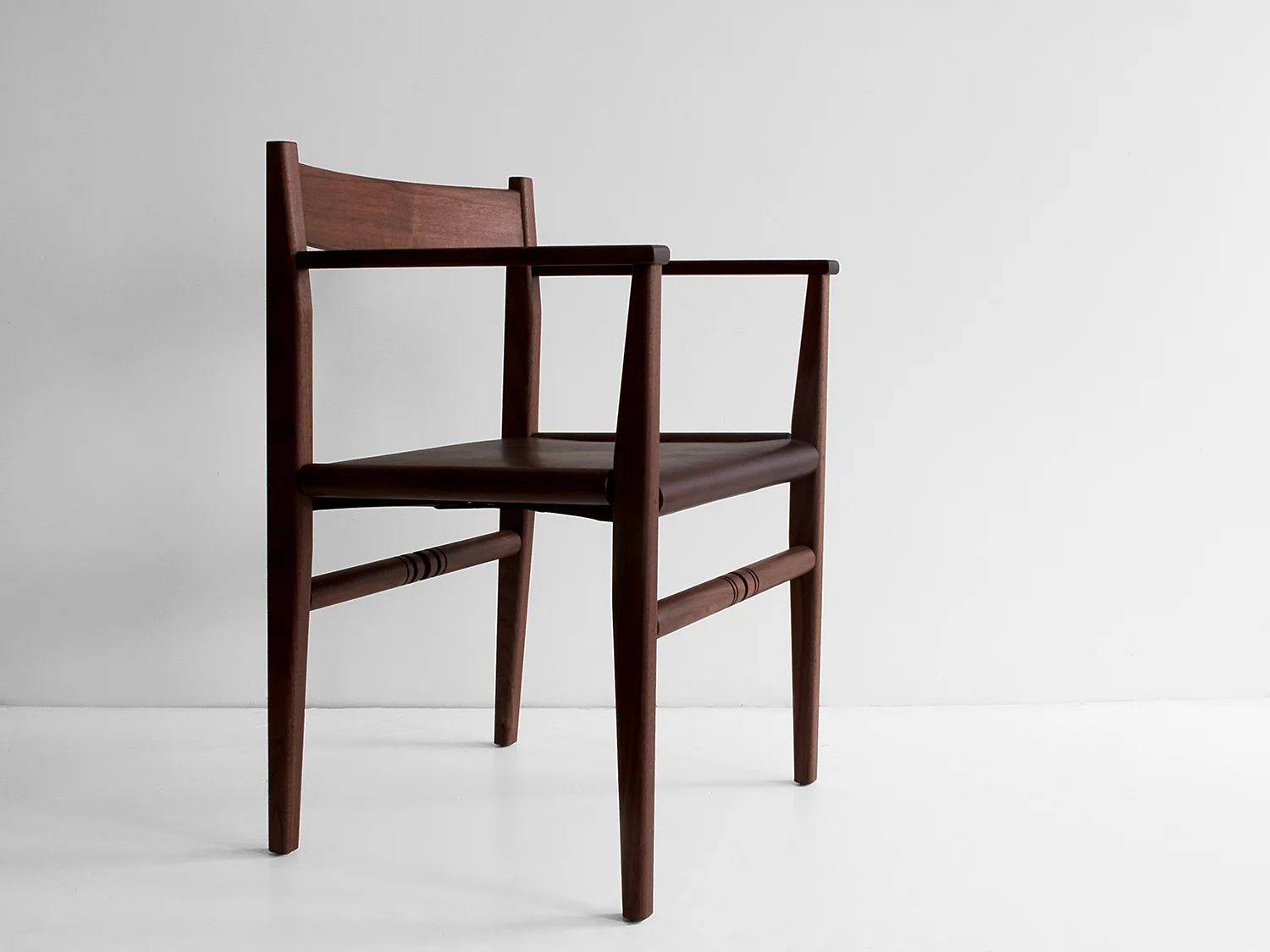 Black walnut; oxblood saddle leather