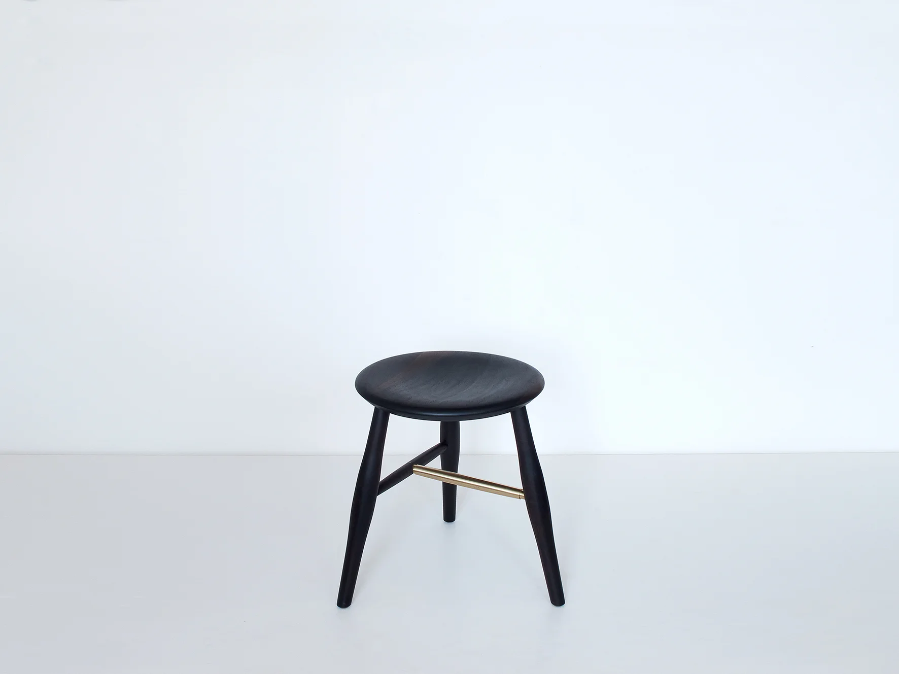 Oxidized black walnut, brass rung