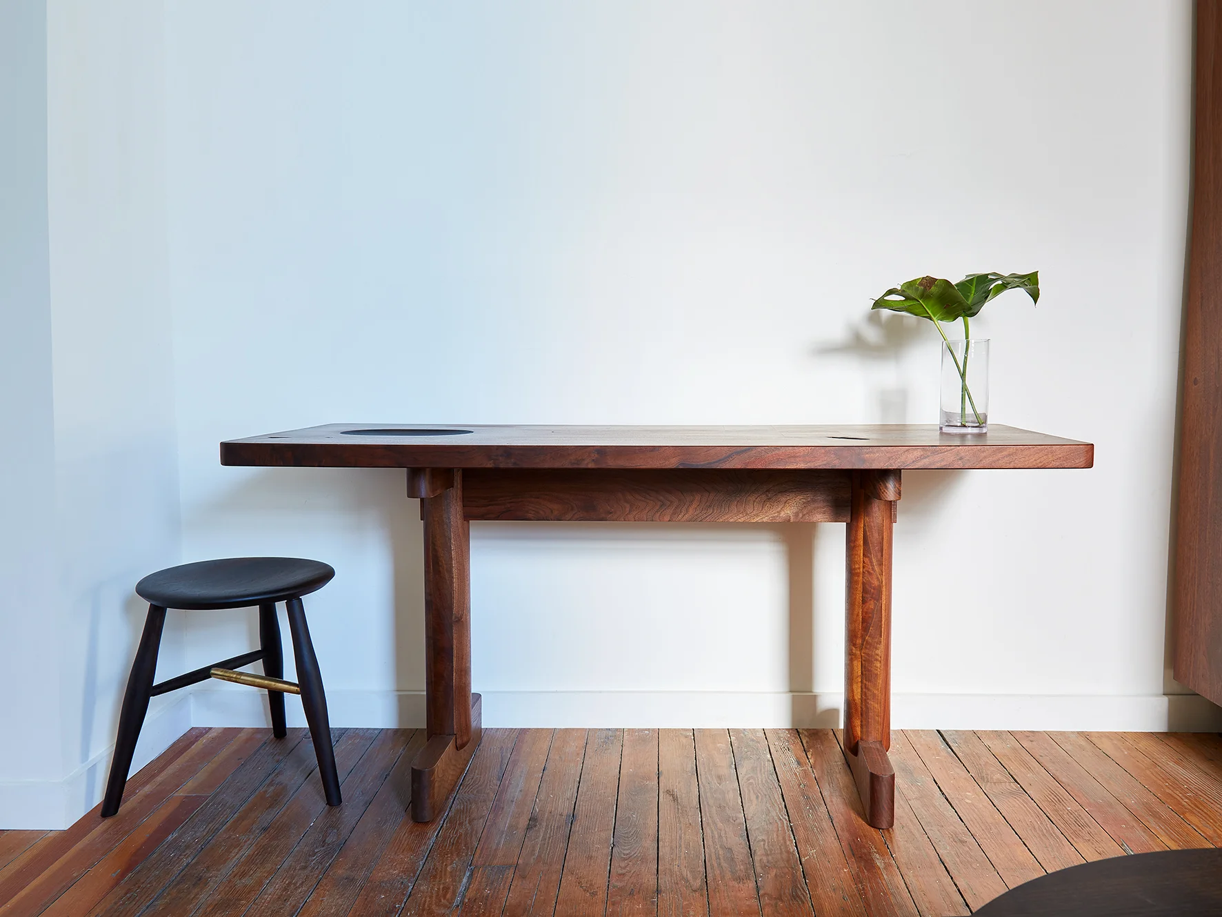 66"L x 24"D x 31"H Claro Walnut, oxidized carved bowl