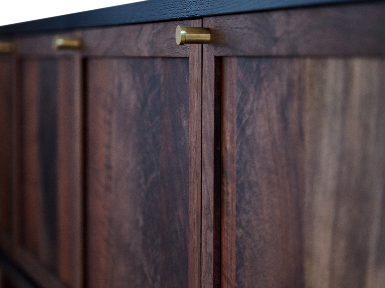 92”L x 20”D x 24”H Claro Walnut fronts, cast iron blue painted case, turned brass pulls