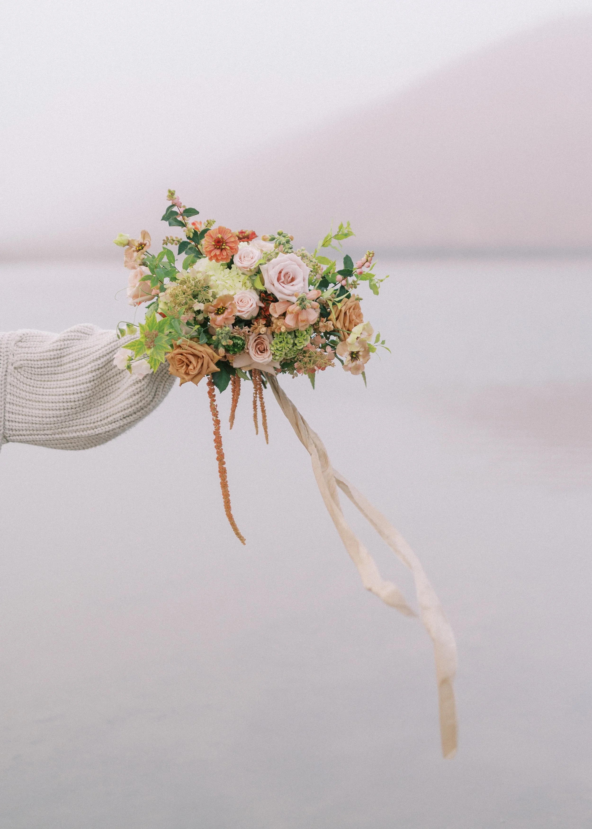  A fall bouquet designed by Twig &amp; Bloom in warm tones of blush and taupe.  
