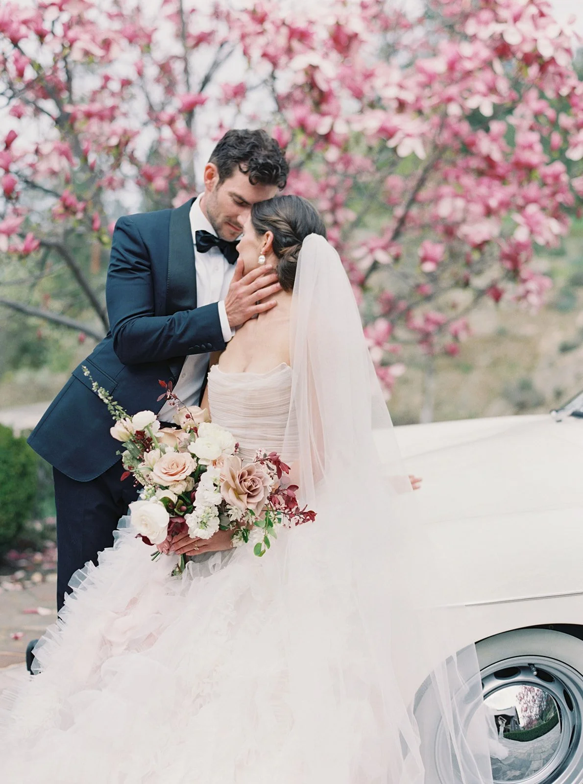 Bride and groom with a Twig & Bloom  wedding floral bouquet.