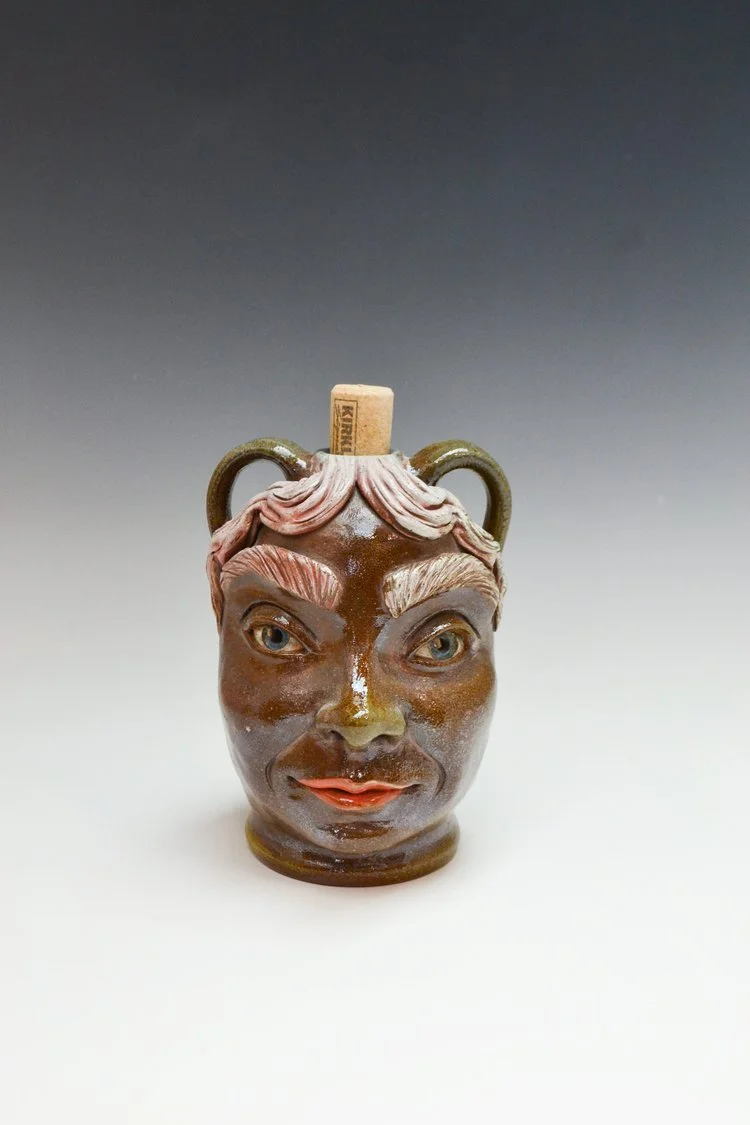 Megan160-SmallSodaFiredFaceJug-1.jpg
