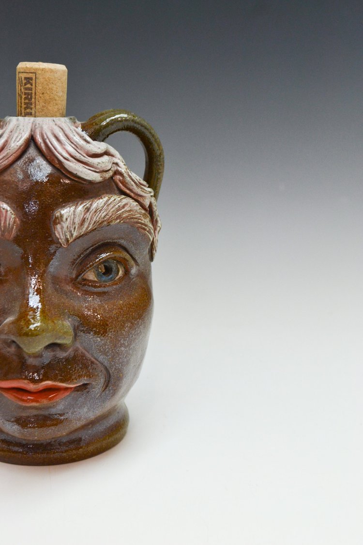Megan160-SmallSodaFiredFaceJug-2.jpg