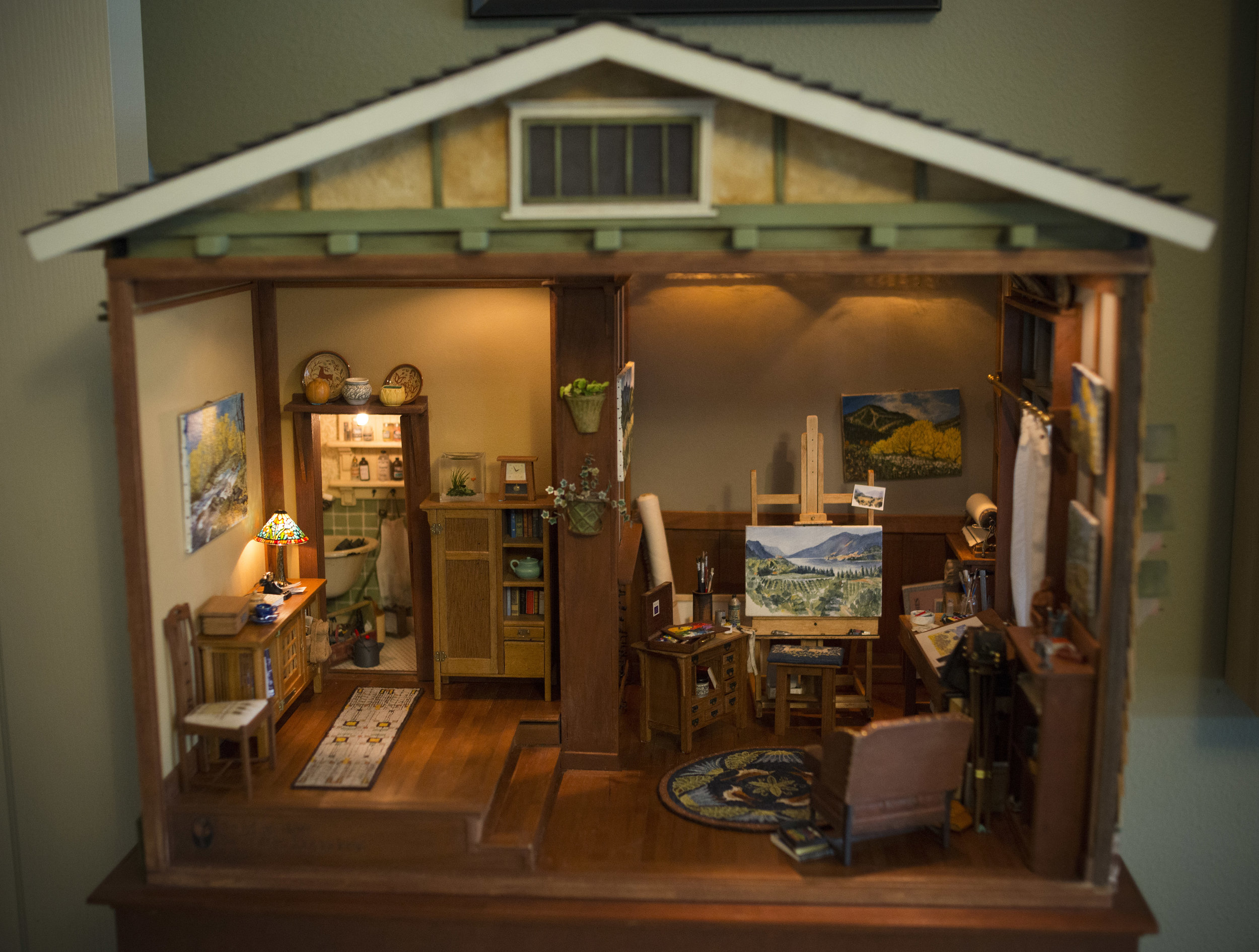 Diane Scott has several models on display at her home in Mohawk Valley and this art room is one of them. Complete with a dark room in the back left corner for photo-processing, Scott's miniature work of art is the perfect hideaway for any artist. (R