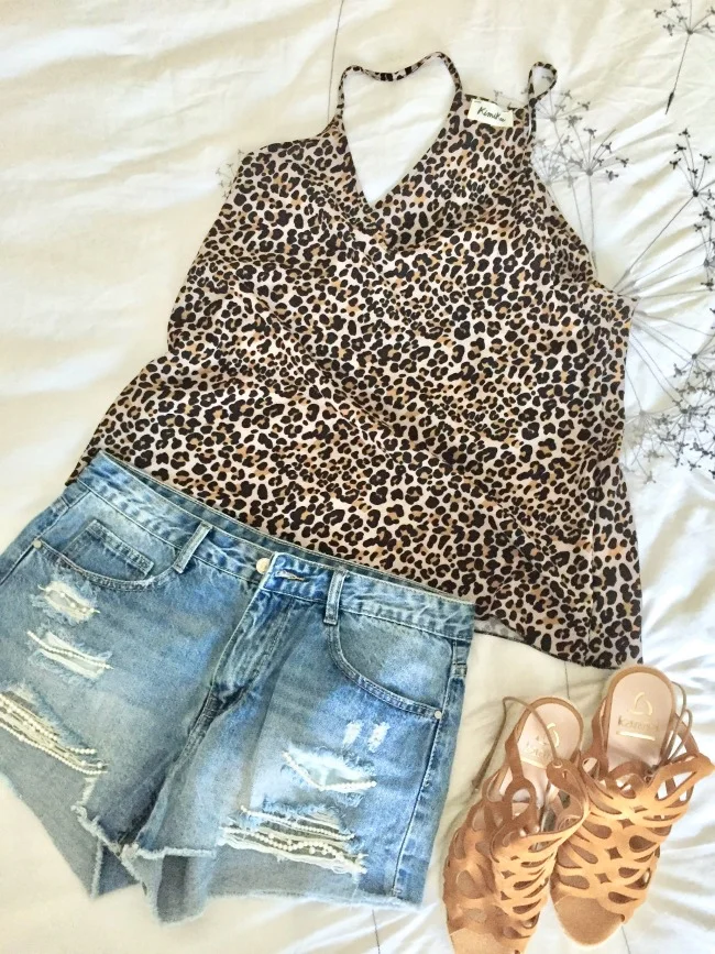 Jules and Louis Blog - How to pack for vacation - lay out outfits.jpg