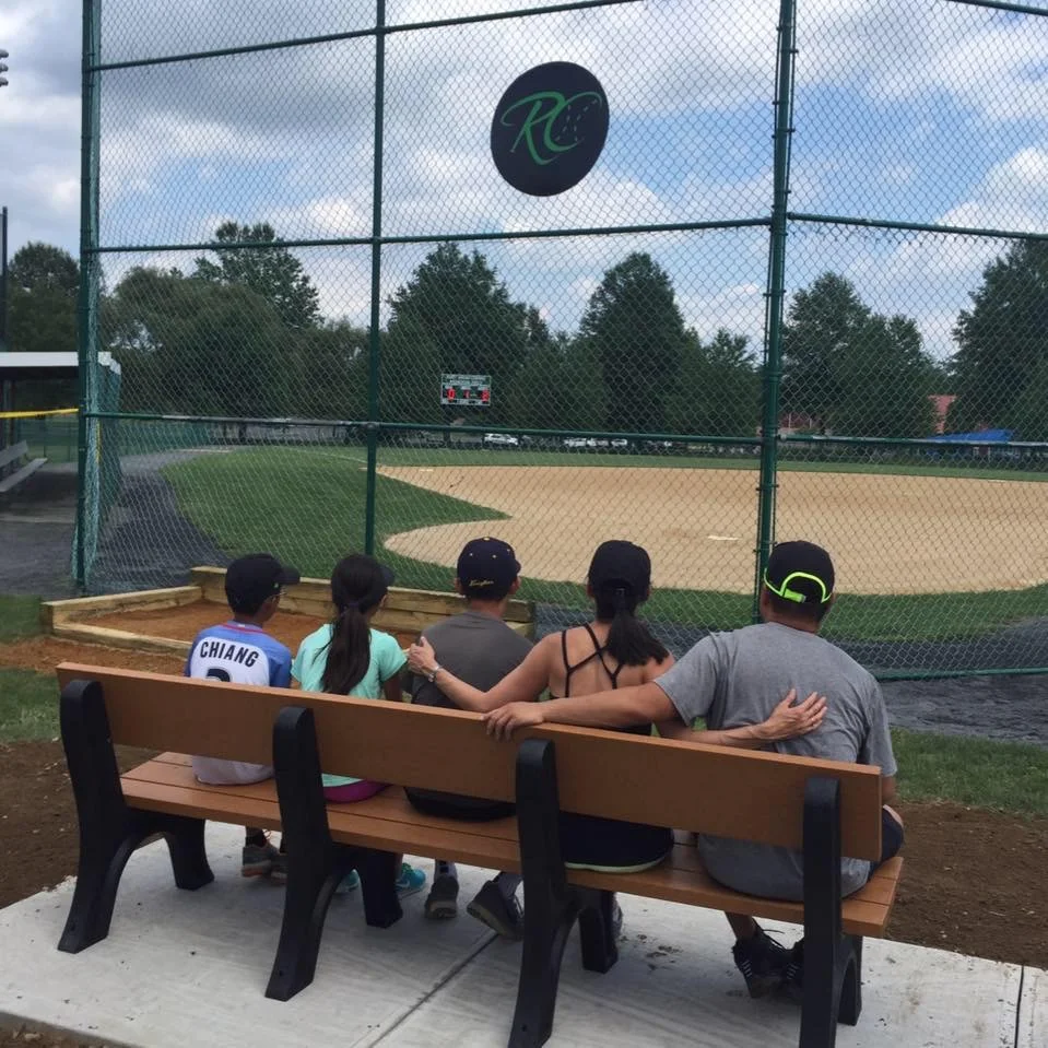 Siblings and kids look over Ruby's field