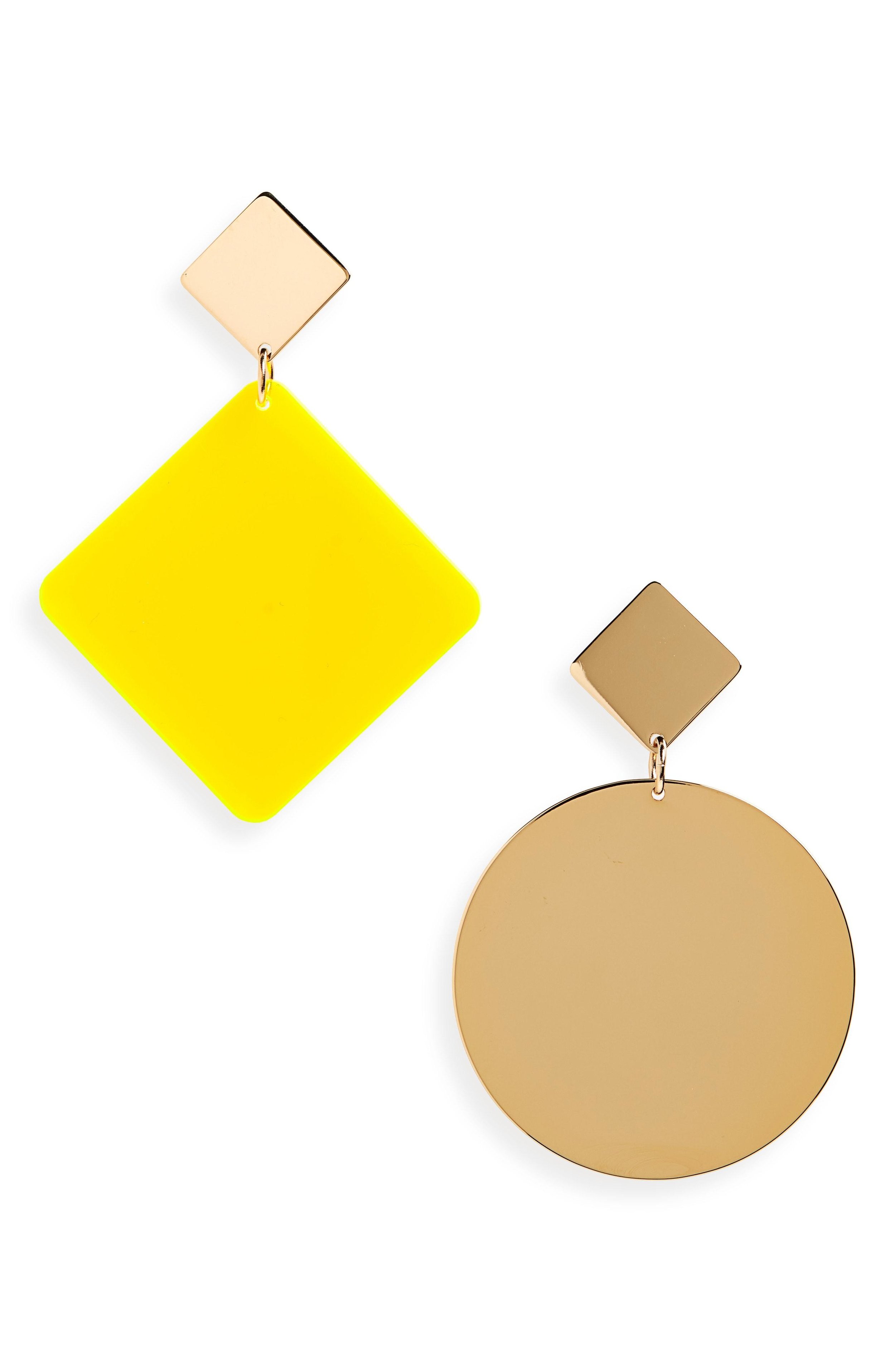 isabel-marant-Yellow-Asphalt-Mismatched-Earrings.jpg