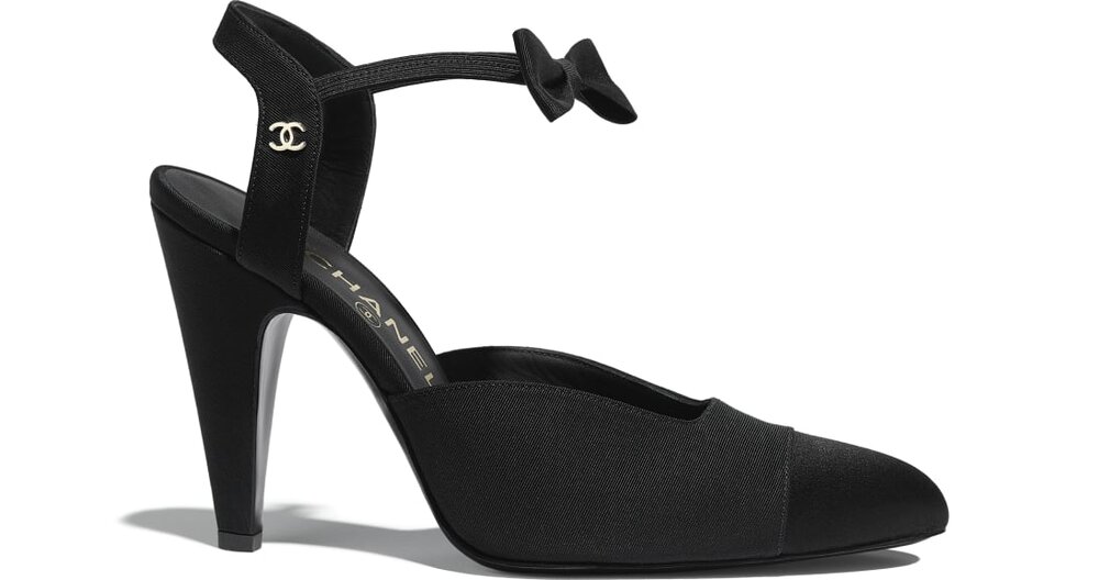 Chanel black velvet pumps with rhinestone and sequin bow.