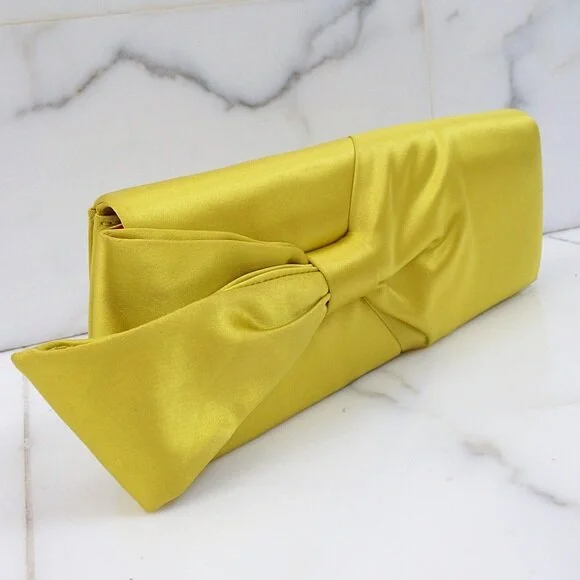 Christian Louboutin Satin Bow Clutch in Yellow