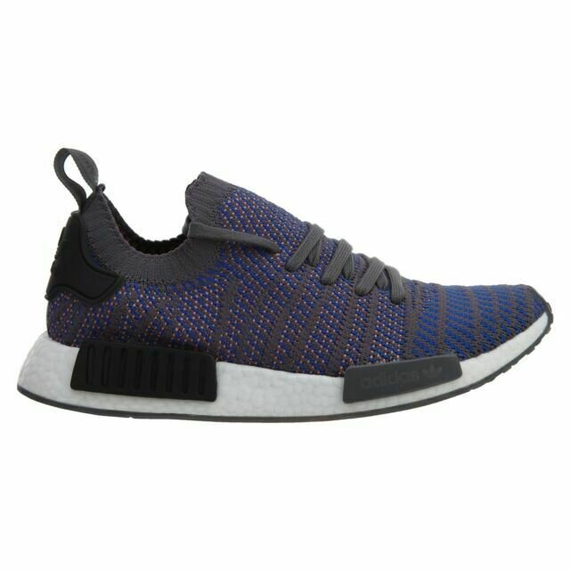 Adidas NMD_R1 STLT Primeknit Sneakers in Blue : Core Black : Chalk Coral.jpg