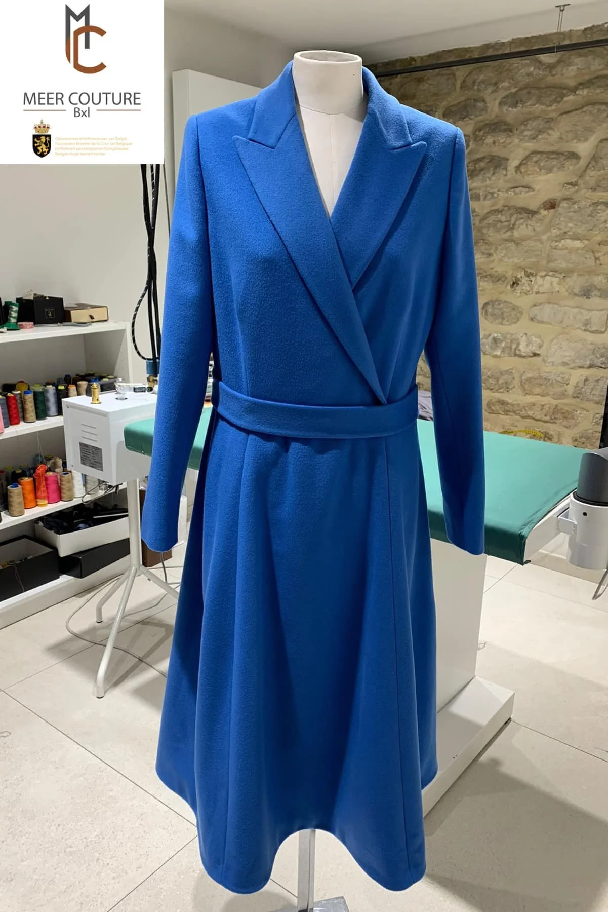 Meer Couture Belted Wrap Dress in Blue
