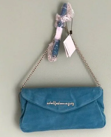 Adolfo Dominguez Suede Flap Clutch in Coral