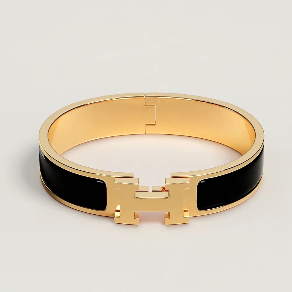 Hermès Clic H Bracelet in Noir/Gold — UFO No More