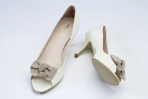 Prada Bow Peep Toes Pumps in White Leather