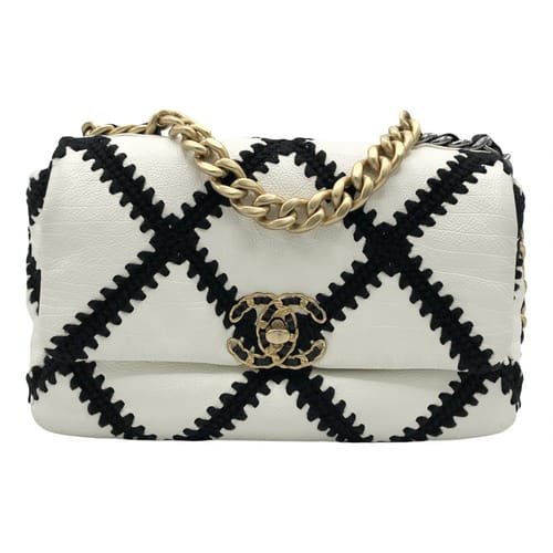 Chanel Black And White Logo Bag