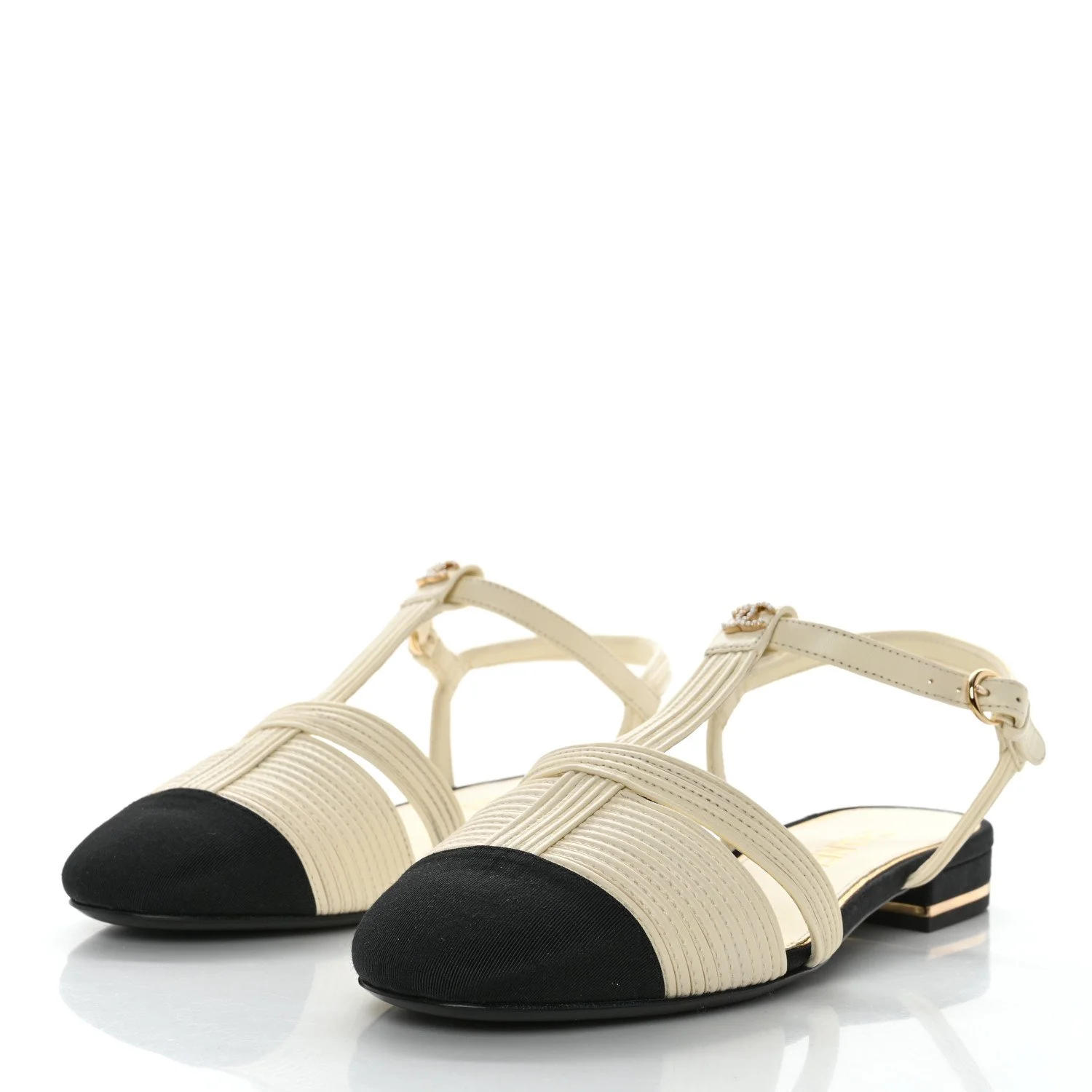 Chanel T-Strap Cap-Toe Logo-Embellished Flat Sandals in Ivory/Black