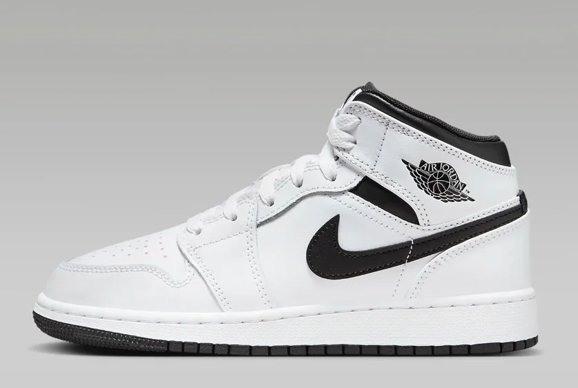 Nike Air Jordan 1 Mid Sneakers in White/Black