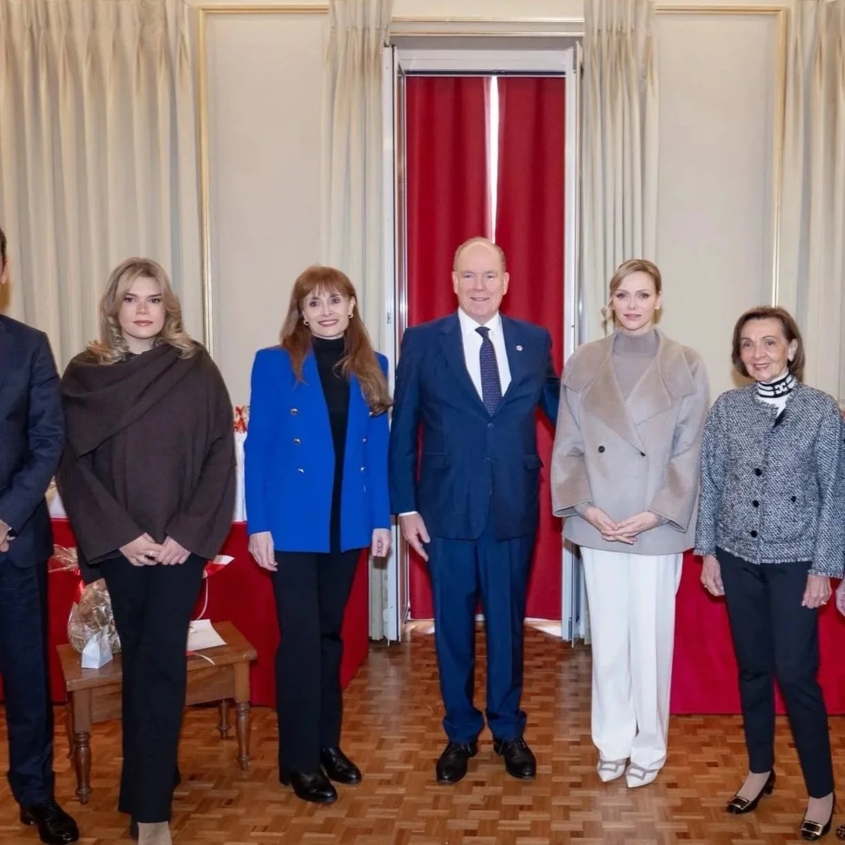 Prince Albert and Princess Charlene distribute gifts to beneficiaries of the Monegasque Red Cross