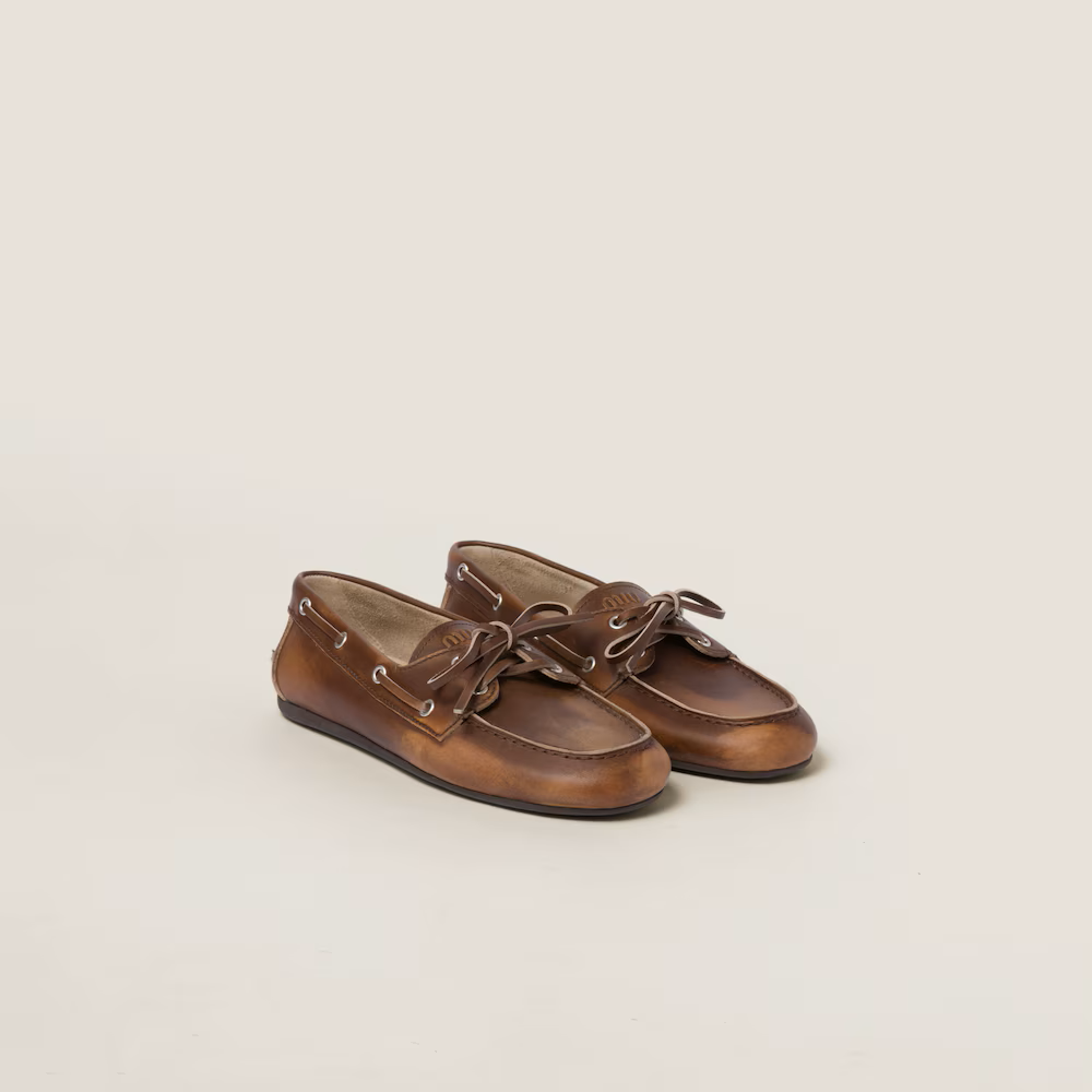 Miu Miu Unlined Bleached Leather Boat Shoes in Sienna.png