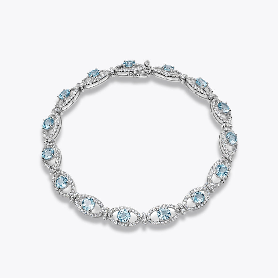 Kiki McDonough Signatures Blue Topaz and Diamond Oval Link Bracelet.png