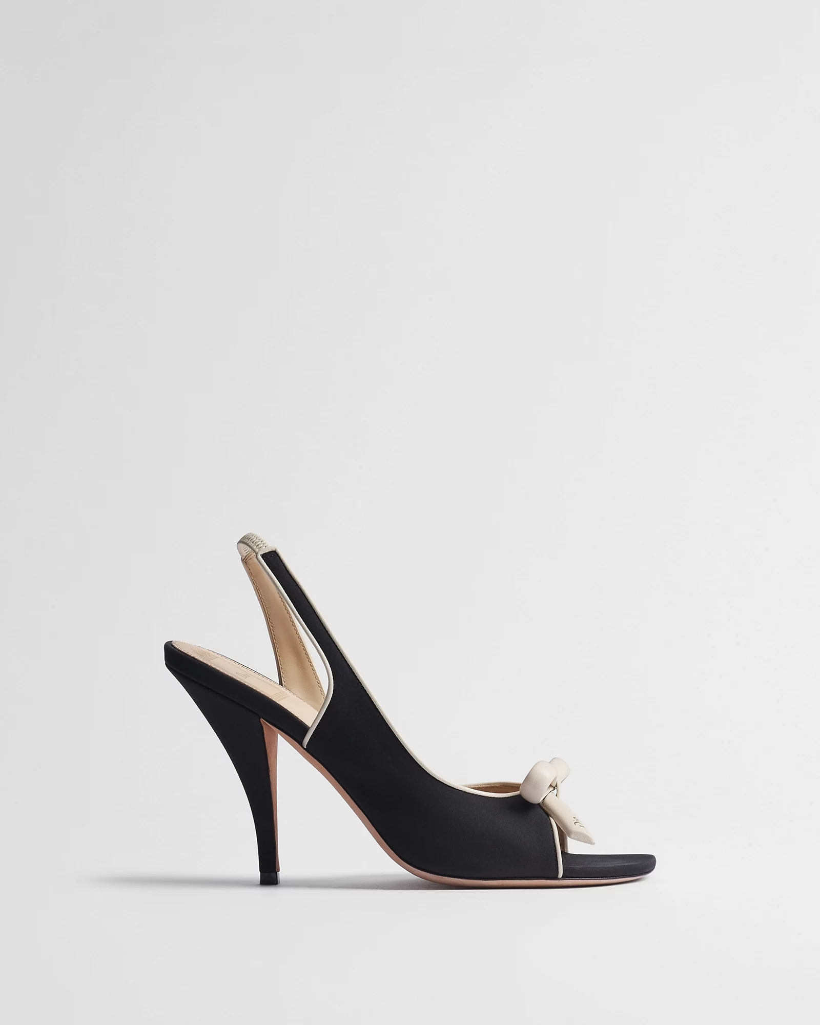 Christian Dior Dior Bow Heeled Slingback Sandal in Black and White Supple Calfskin