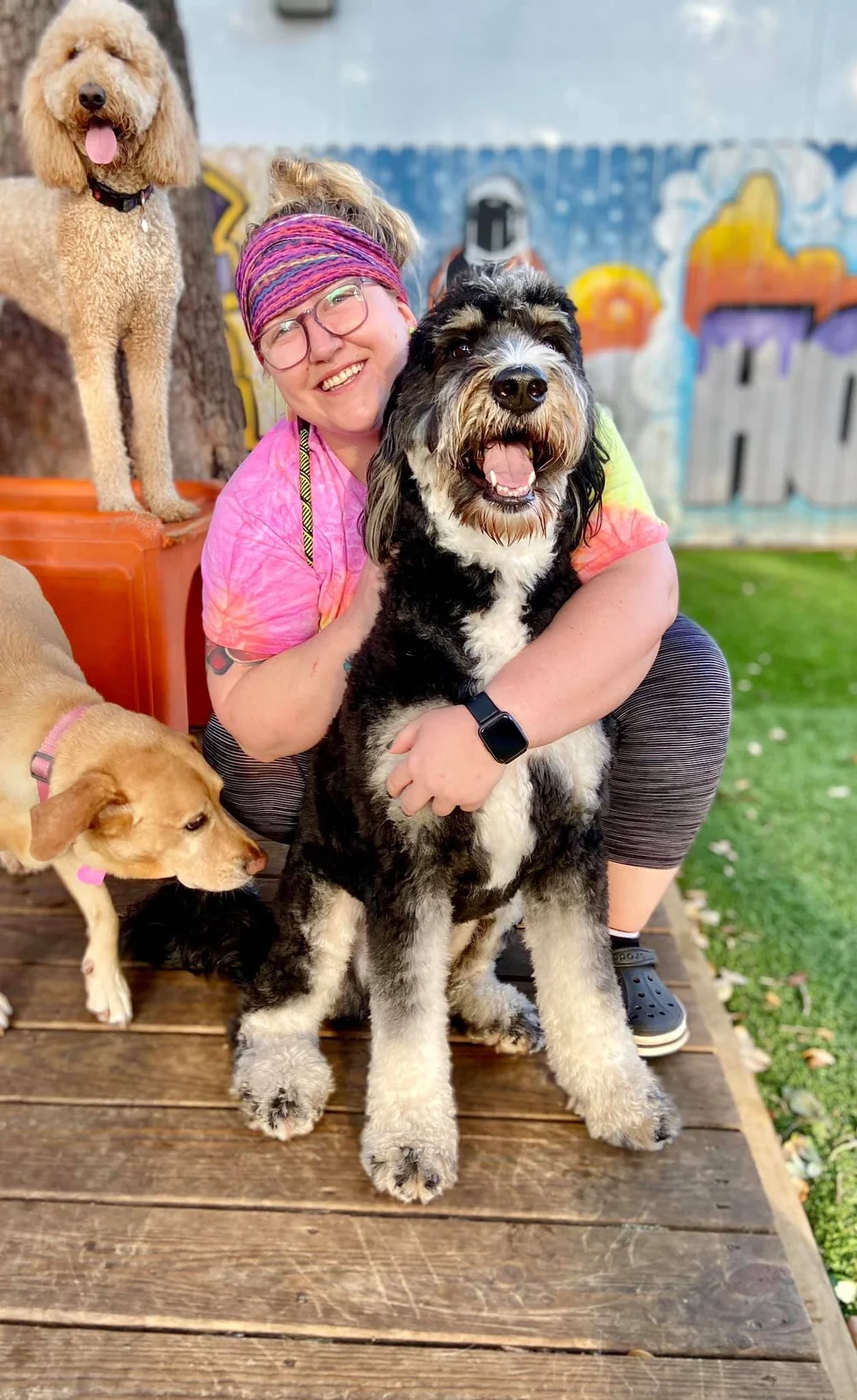 Wag'n World employee with dogs