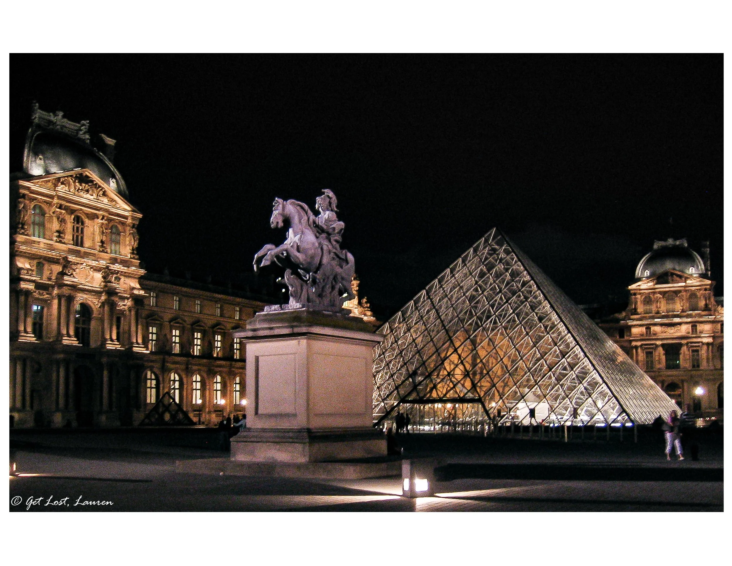 The Louvre at night.