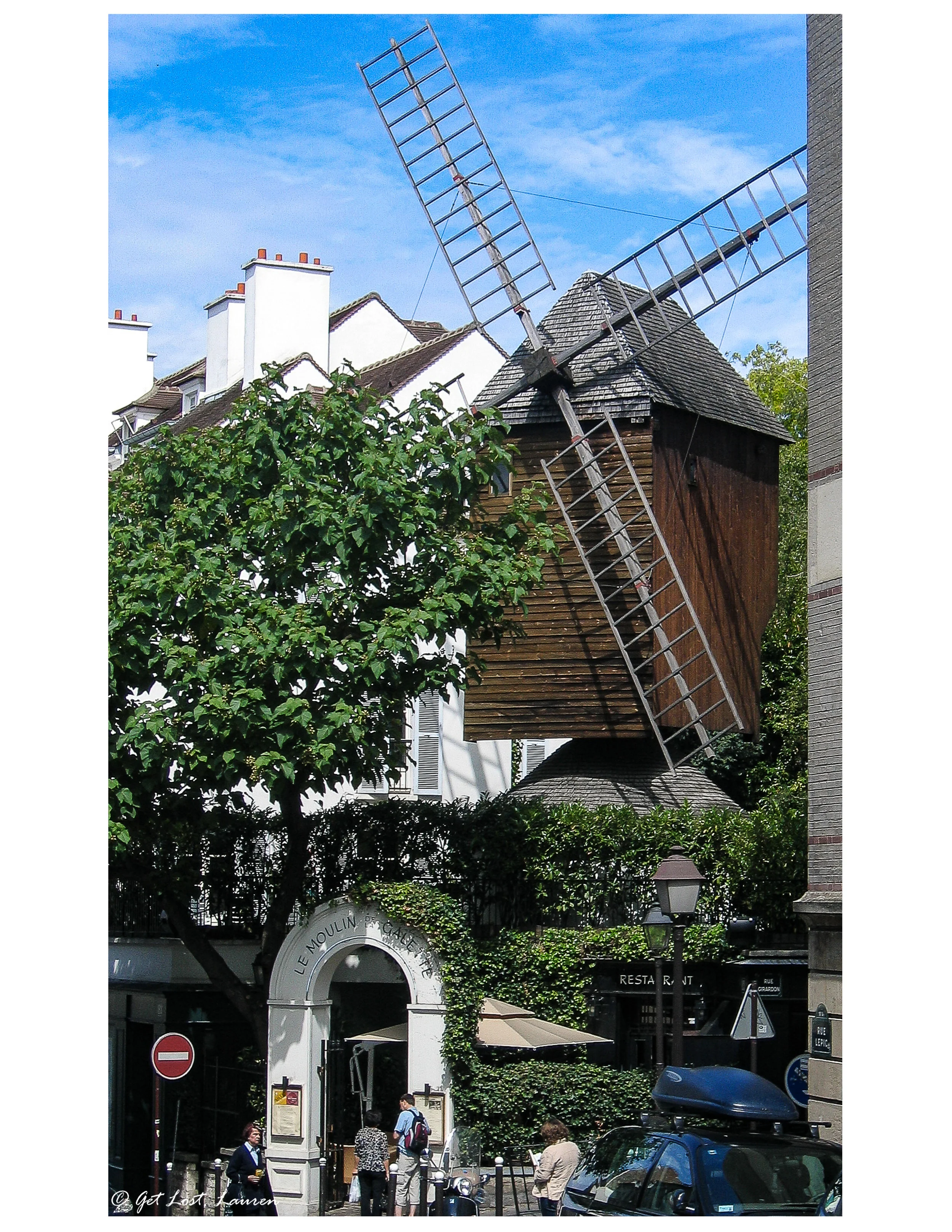 One of the last remaining windmills on Montmartre is home to a restaurant.