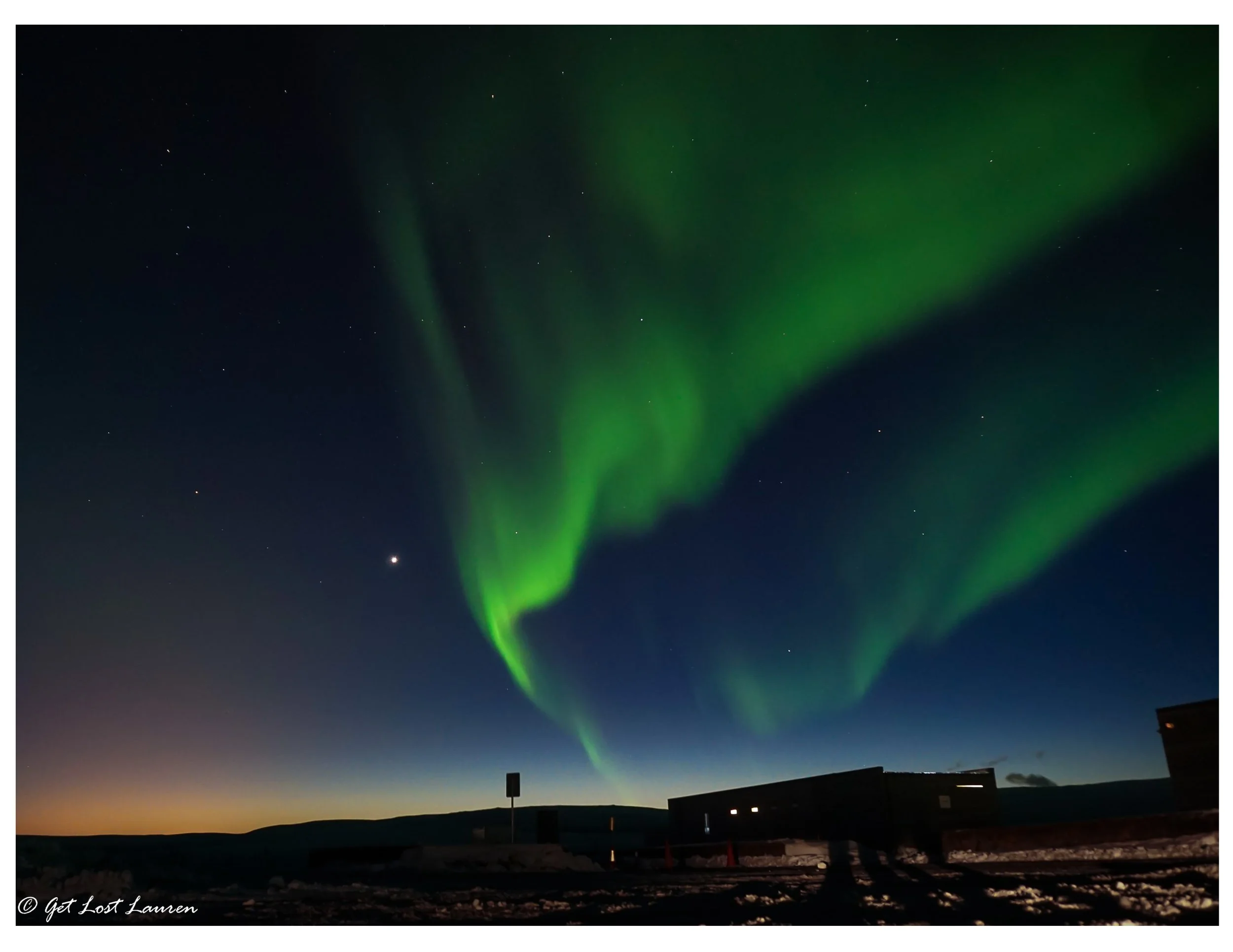 Northern Lights over Þingvellir Visitor Center with the glow from the lights of Reykjavik. Sony a5000, f4/ISO 800/4"