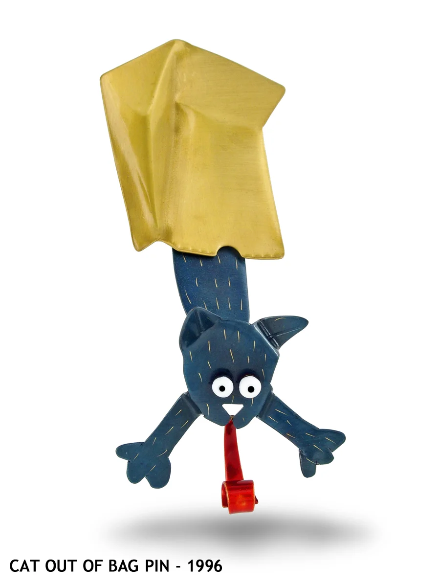 CatOuttaBag150.jpg