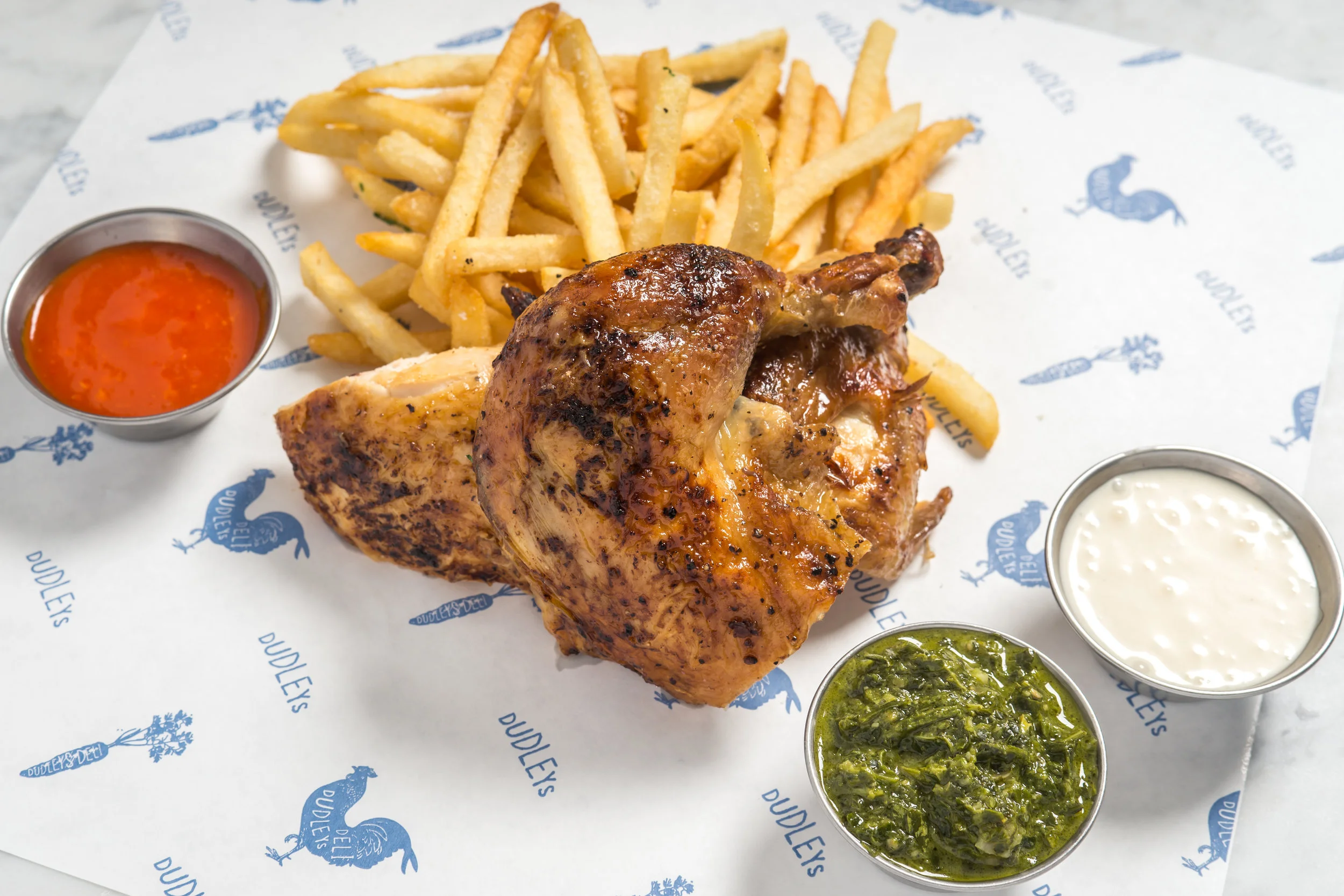 Half Chicken with Fries and Condiments (Photo Credit Paul Wagtouicz).jpg