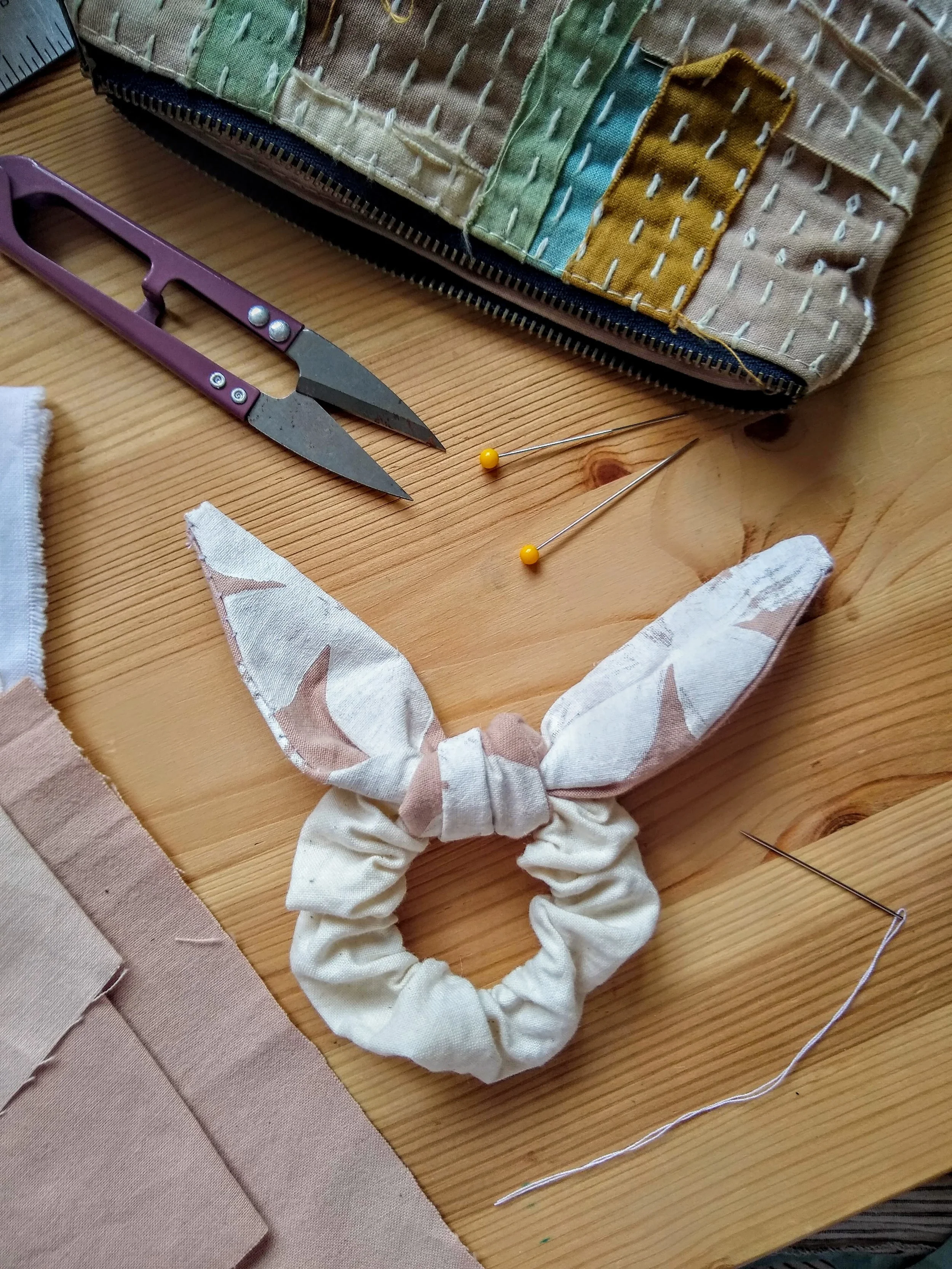 12. Tie your smaller sewn tube around your scrunchie where you connected the two ends. Pull it tight and you’re stylin’!