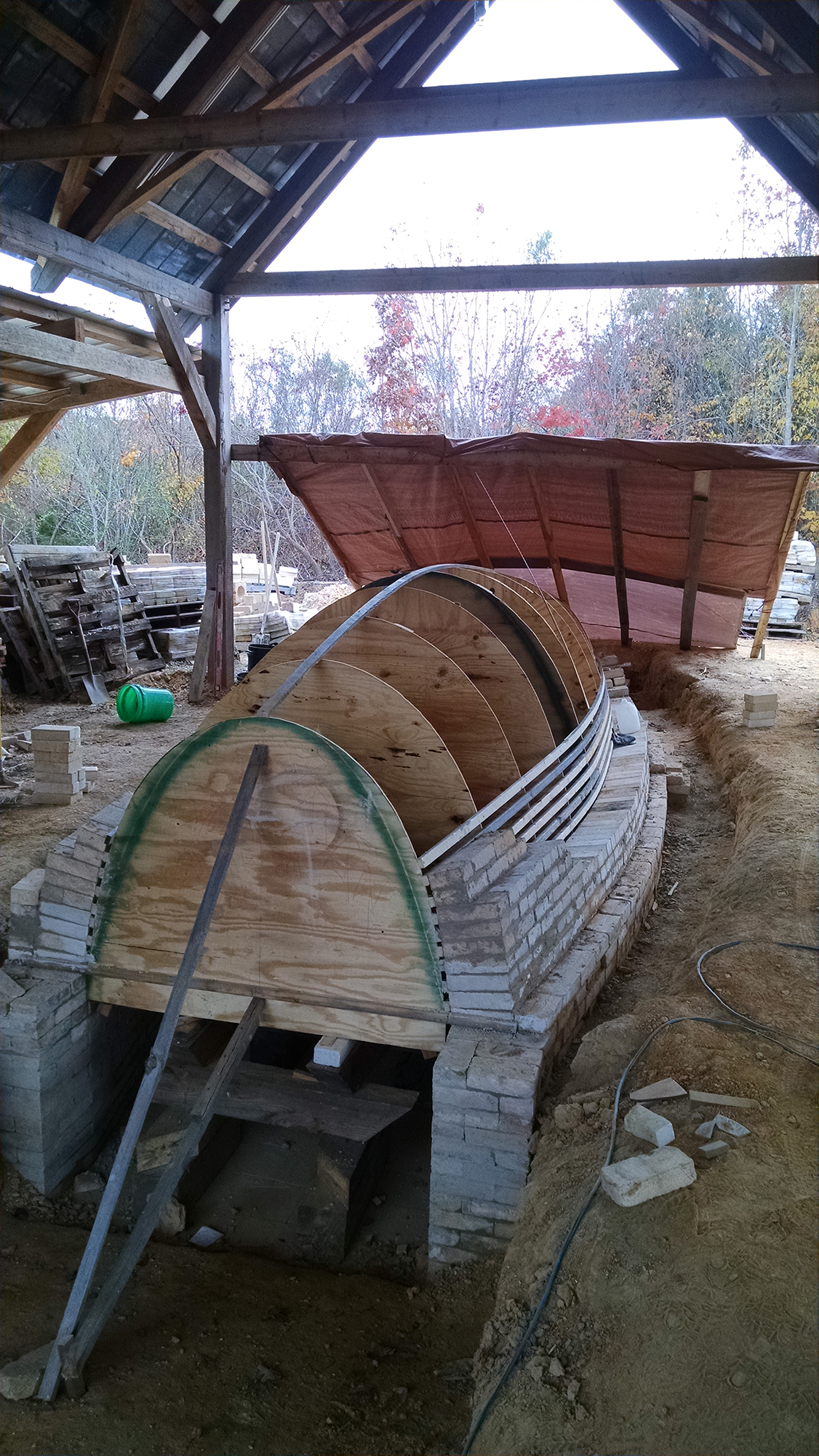 I started by standing the ribs up and secured them in place. The strips are then screwed down into the ribs.
