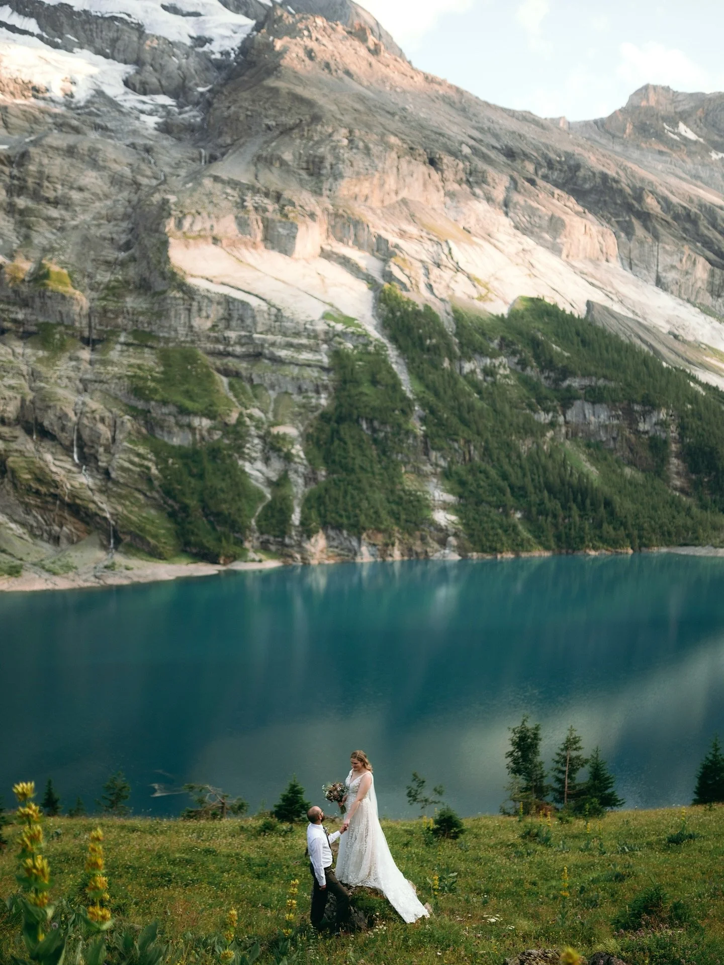 Throwback to July, when we hiked through the breathtaking beauty of Switzerland for @whitney_lovely &amp; Alexi&rsquo;s elopement. From deep talks about politics, religion, and our favorite fae-smut books, to laughing under the stars in the middle of