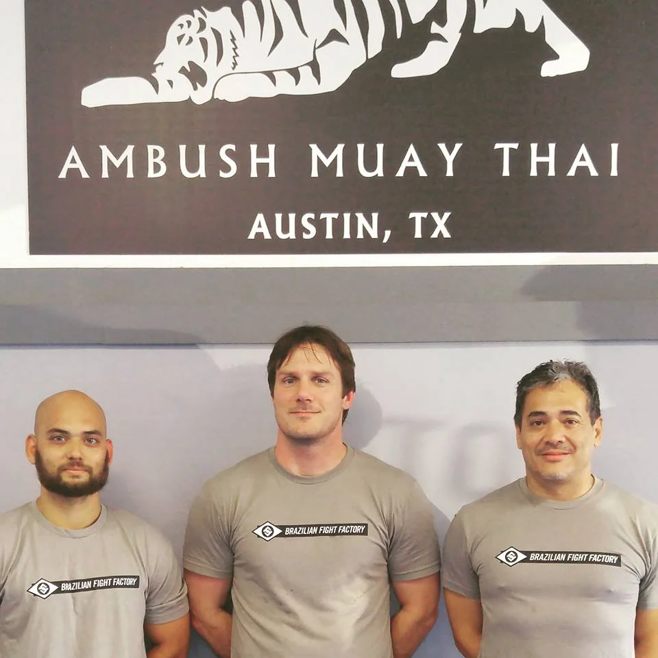 Ambush Muay Thai coaches: Coach Bobby Peek, Coach Elton Wells, and now Coach Jason Webster.