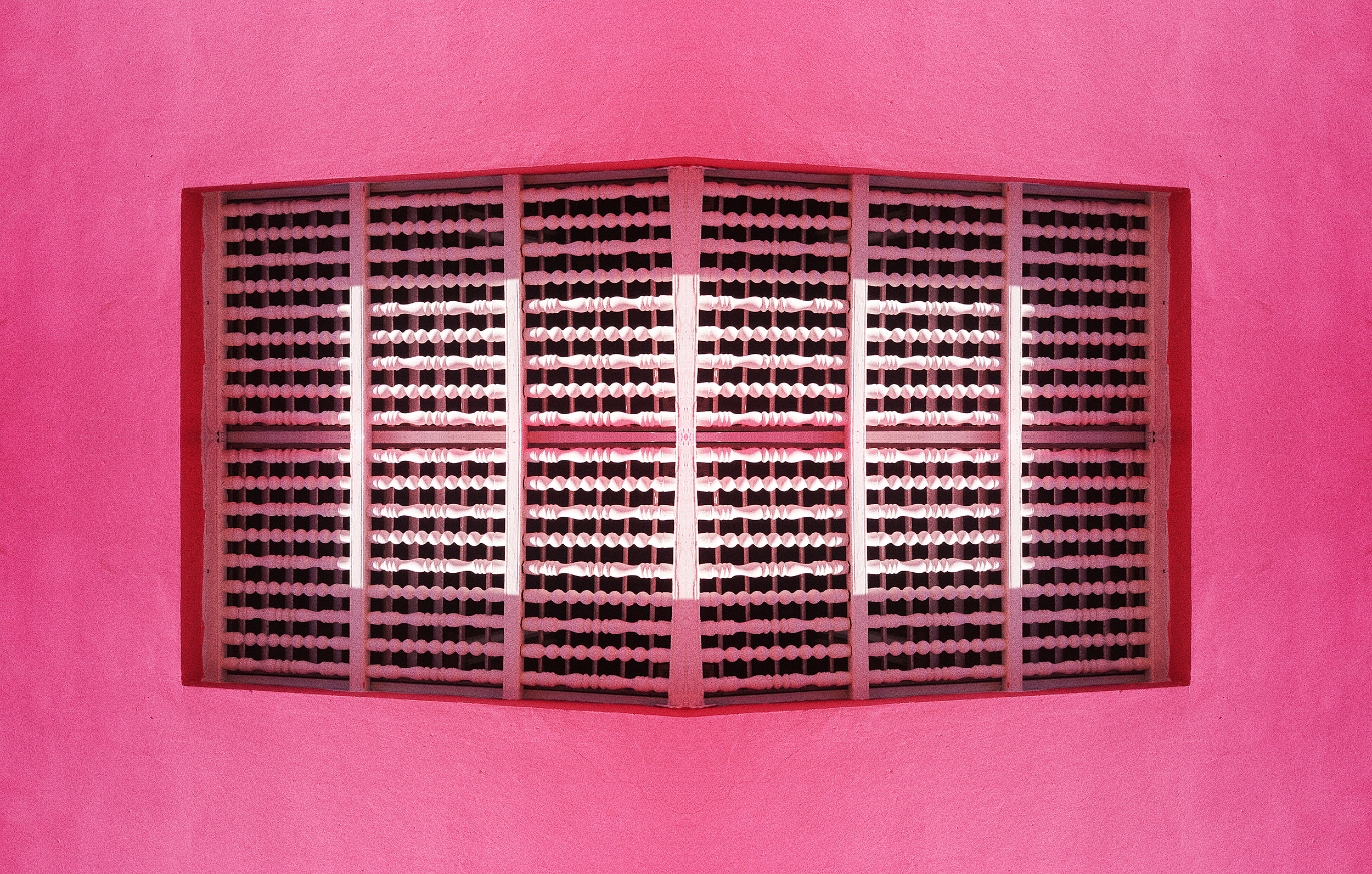 While I was visiting the city of Old San Juan, Puerto Rico, I was fascinated by the architecture of its Spanish-influenced buildings; the bright colors, the intricate balconies, and the underlying geometric shapes all stood out to me. I wanted to highlight those elements through these dynamic, symmetrical, yet perplexing compositions.