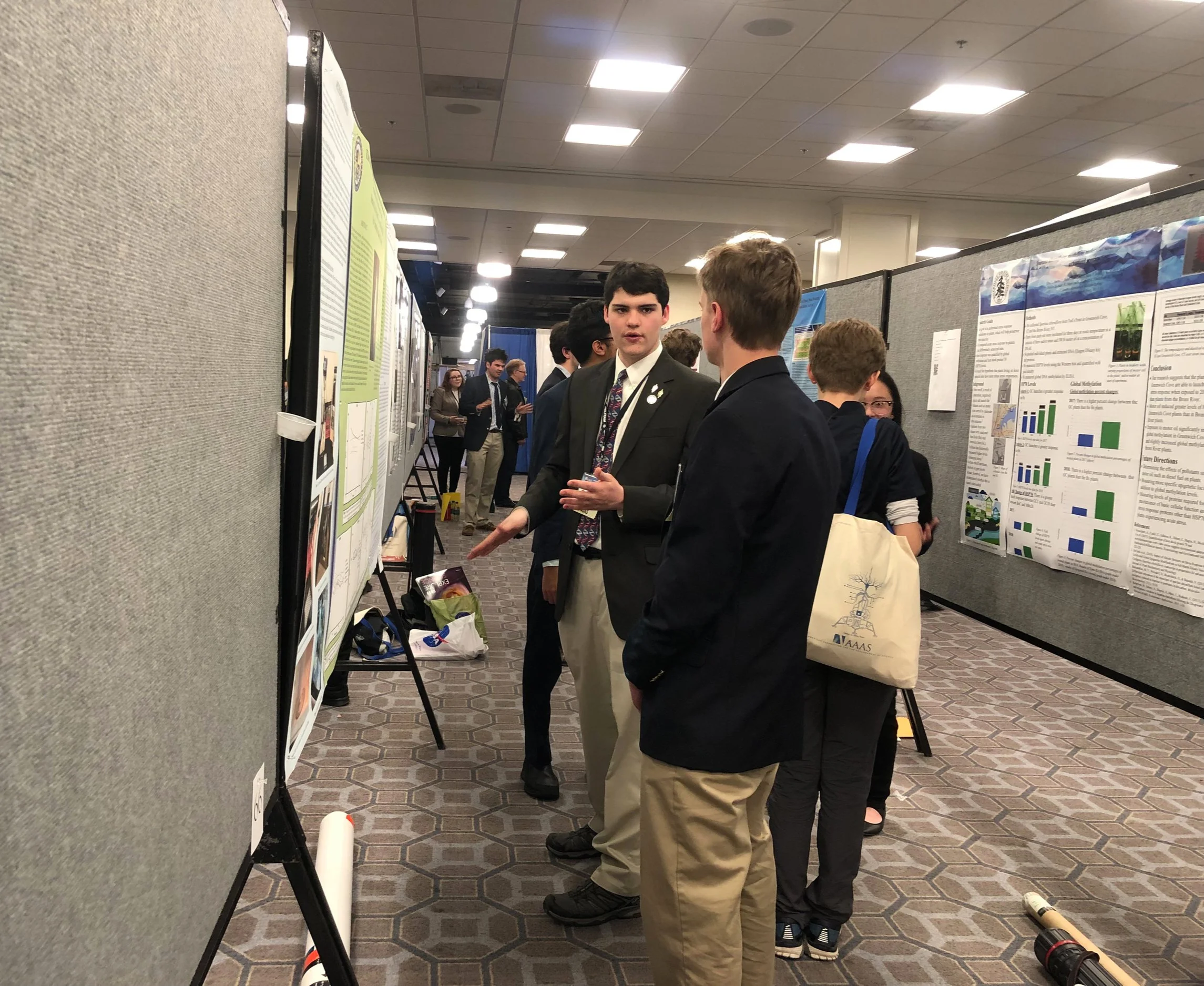 STUDENTS PRESENT THEIR POSTERS TO THE GENERAL PUBLIC & ATTENDEES OF THE AAAS MEETING