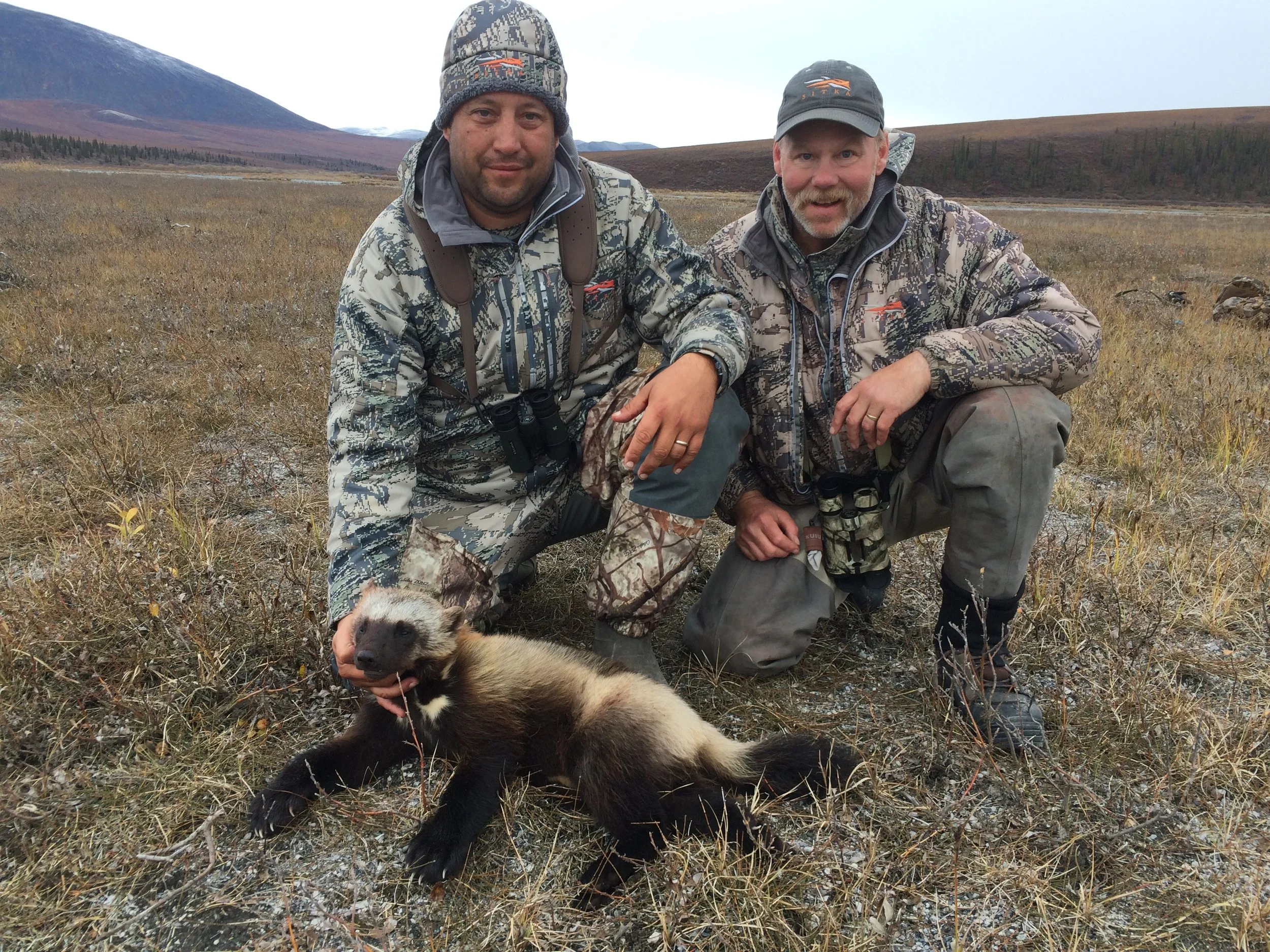 Terry with his guide, Richard, and Terry's wolverine; Fall 2016