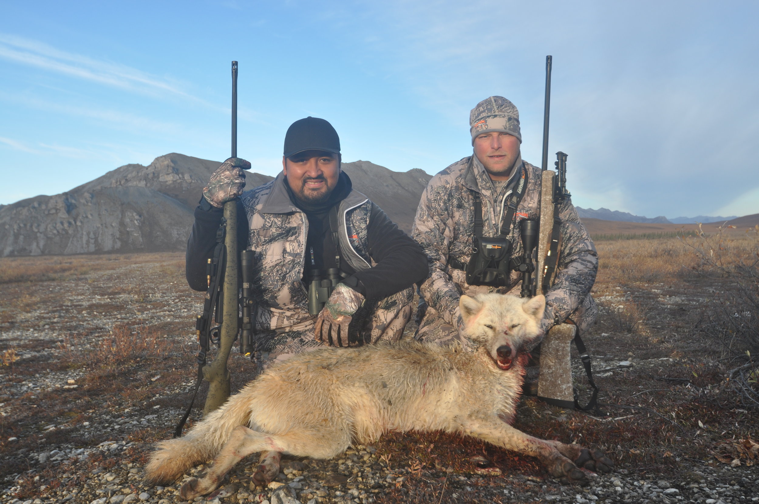 Kanim and Scott with their arctic wolf; Fall 2016