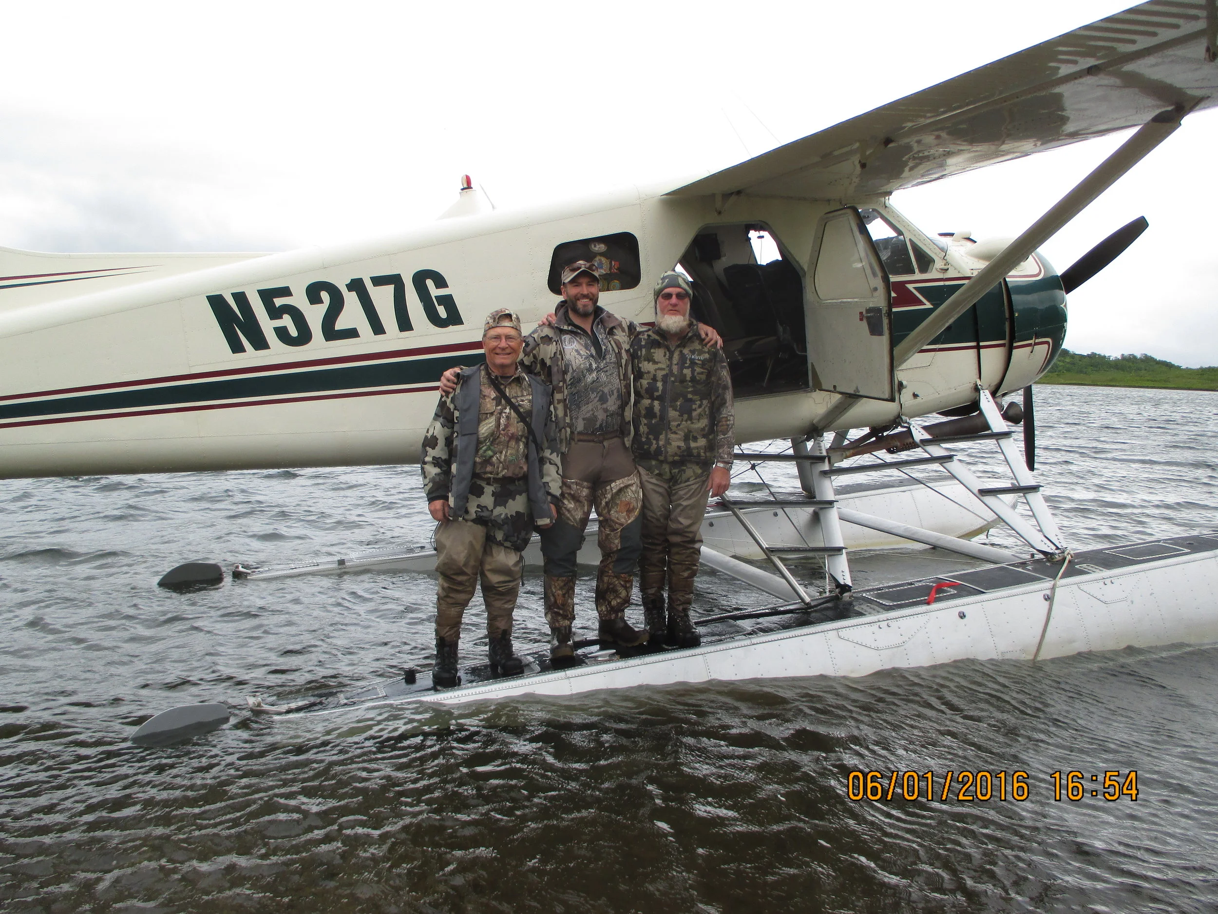 Dave, Lyle and Steve prepare to leave for a brown bear hunt on the Alaska Peninsula; Spring 2016