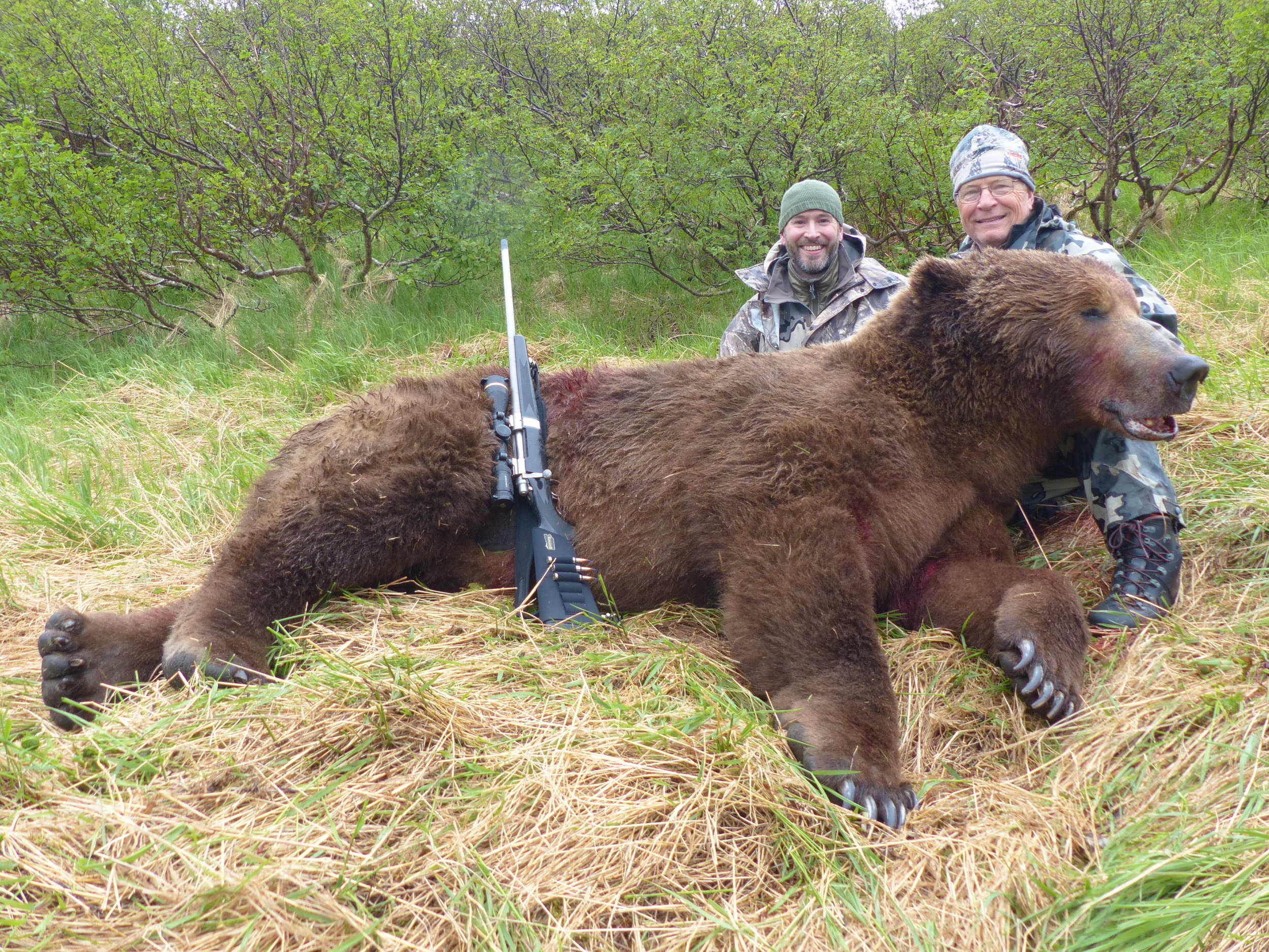 Dave and his brown bear with Owner & Outfitter, Lyle; Spring 2016