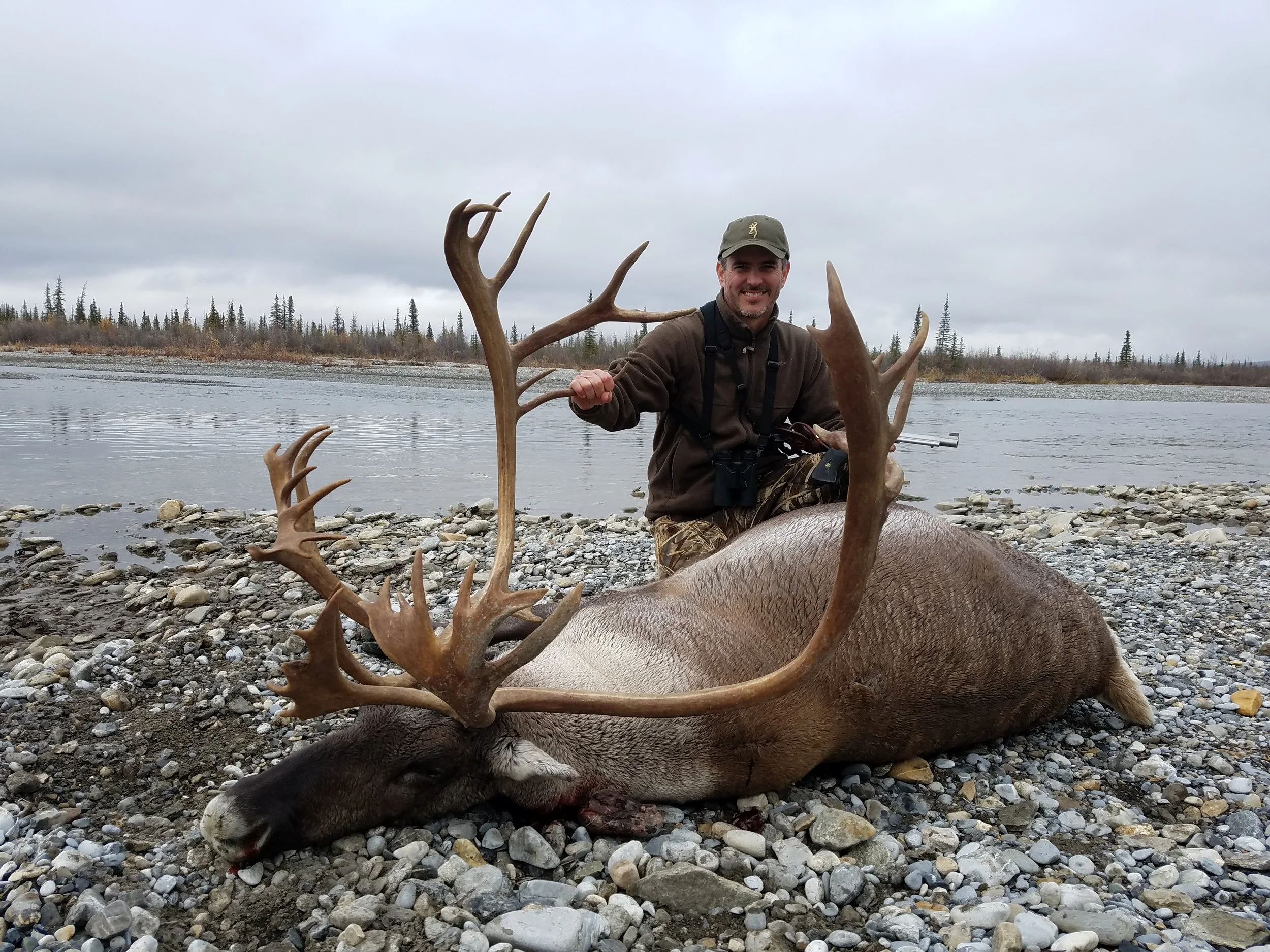 Hunter Darrell Harper with his caribou in the Arctic - Fall 2017