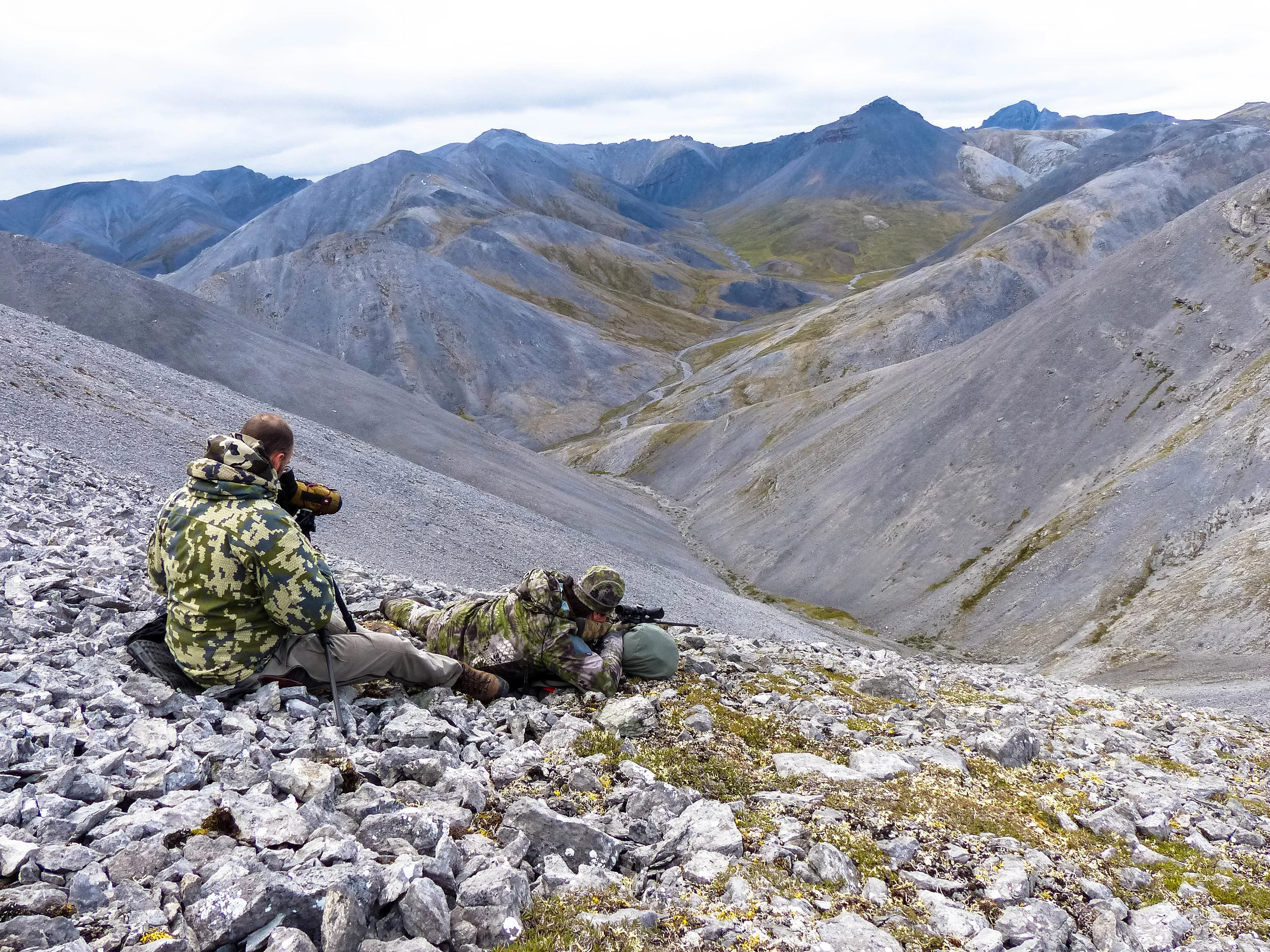 Owner and Outfitter Lyle (left) and James check out a ram while sheep hunting, Brooks Range; Fall 2018