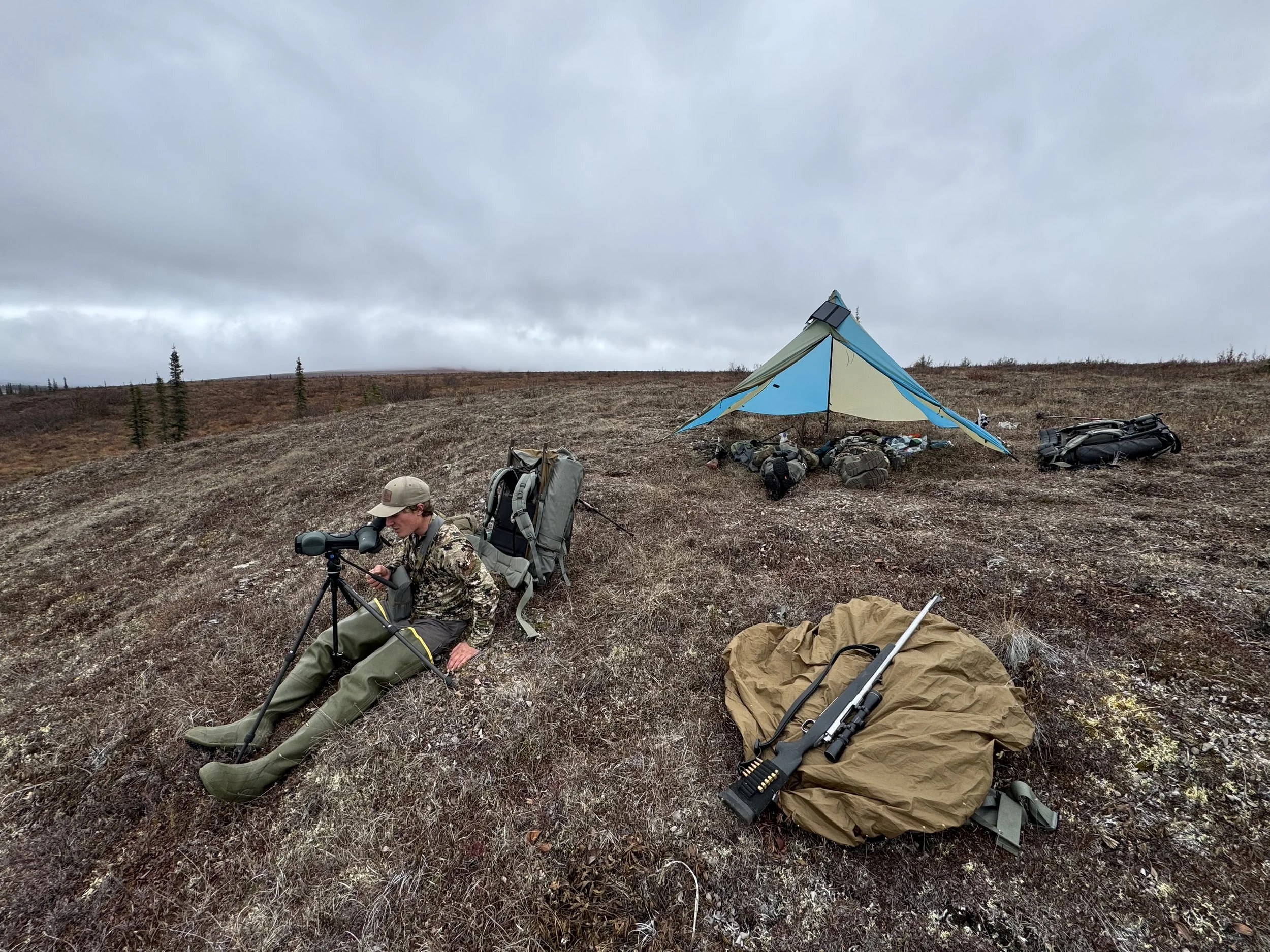 Guide Douglas L. glassing on the spotting hill